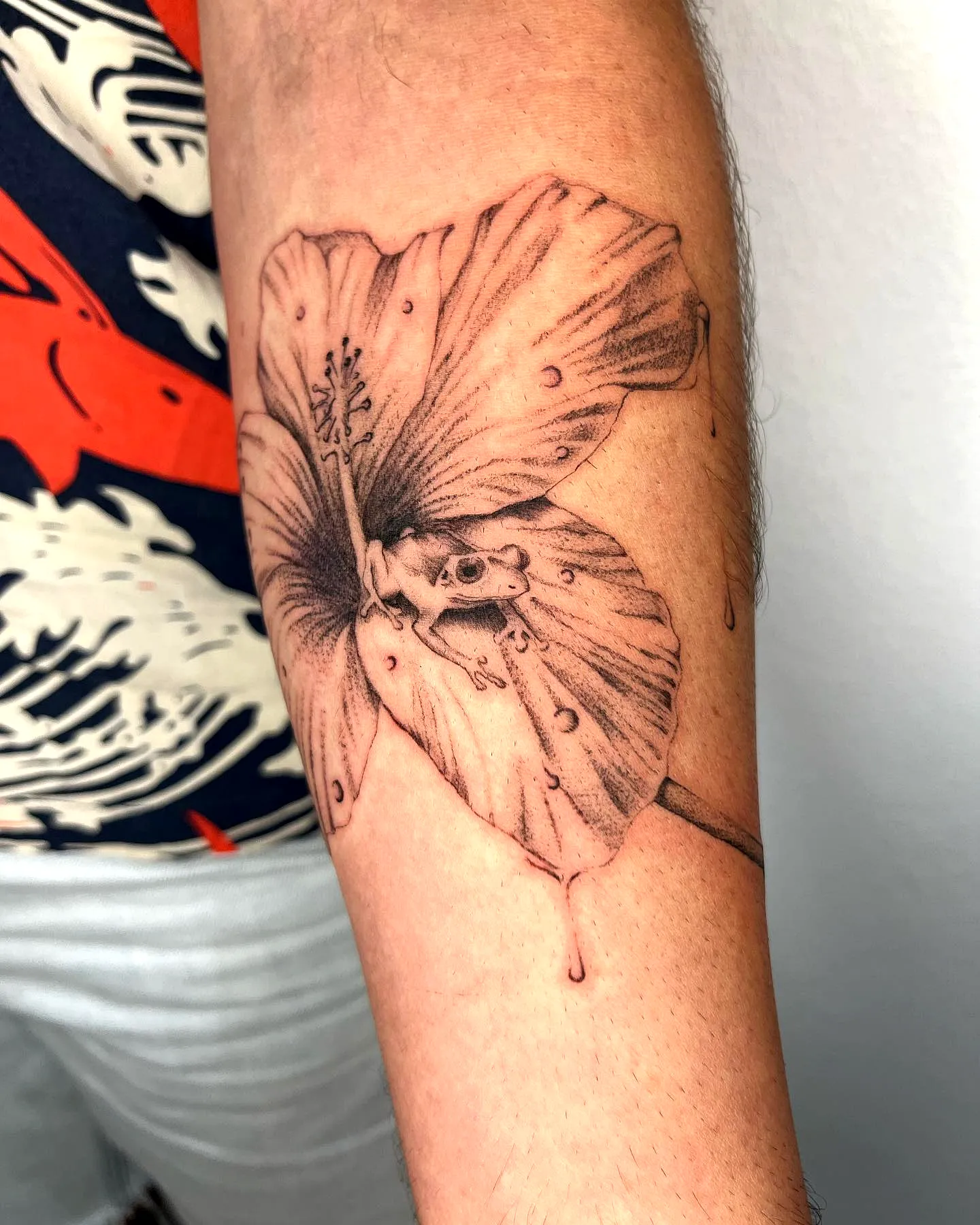 Hibiscus Forearm Tattoo with Frog