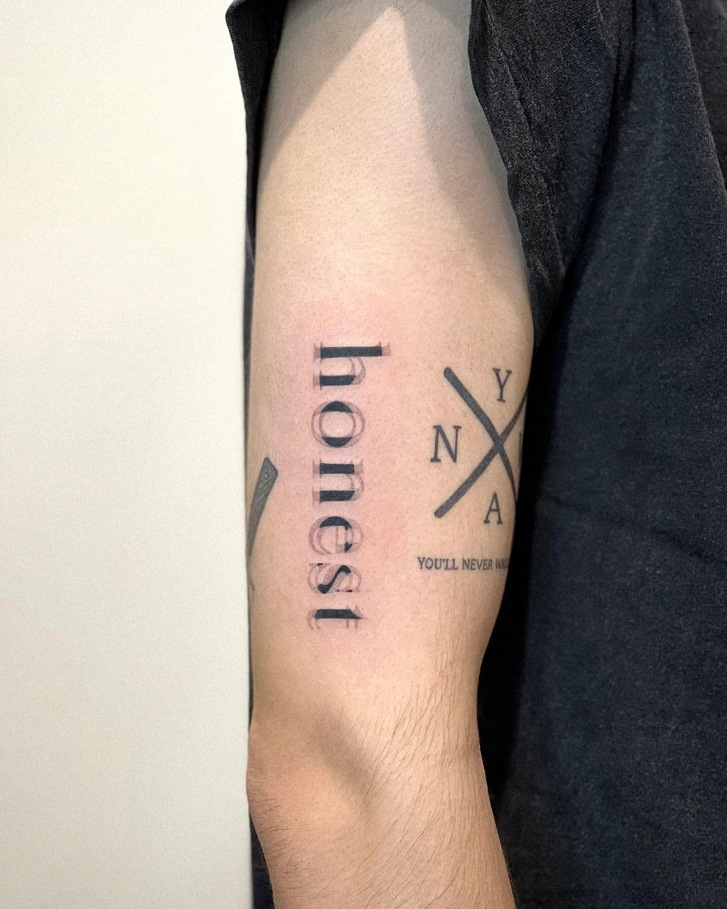 Honest Inner Arm Tattoo with Abstract Elements
