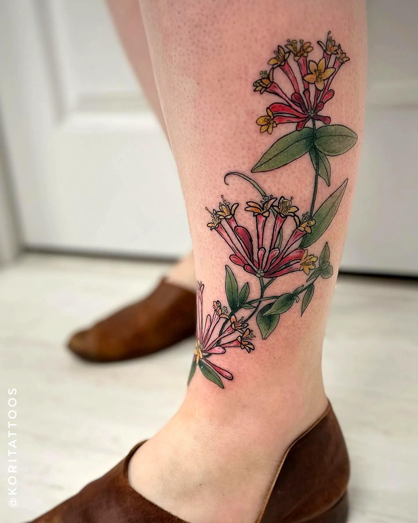 Honeysuckle Calf Tattoo in Vibrant Colors