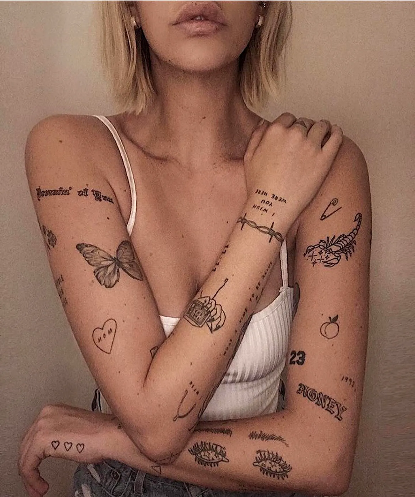 Intricate Arm Sleeve Tattoos in Black and Gray