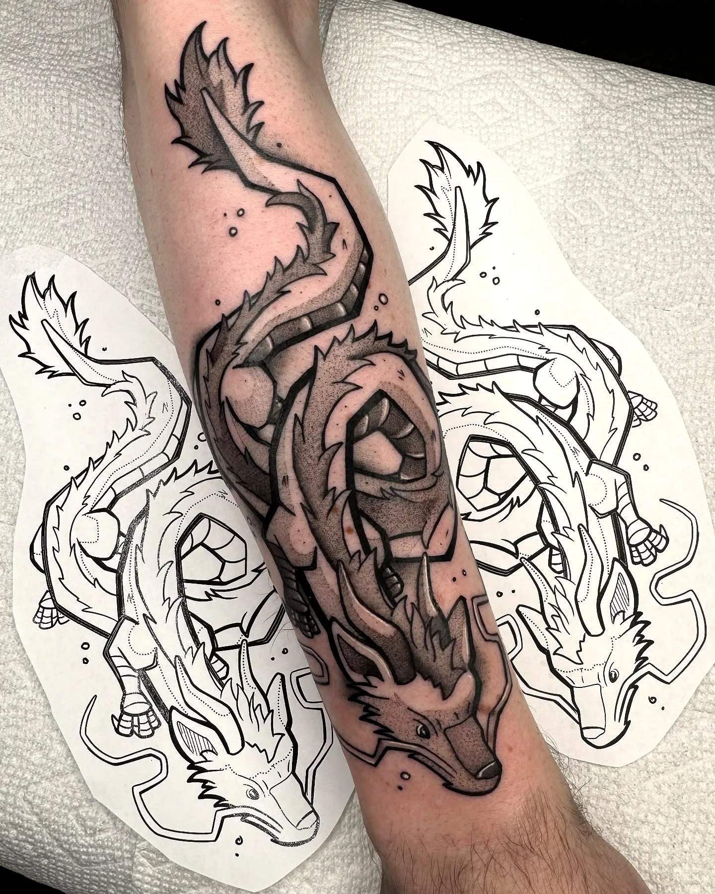 Intricate Dragon Forearm Tattoo Design