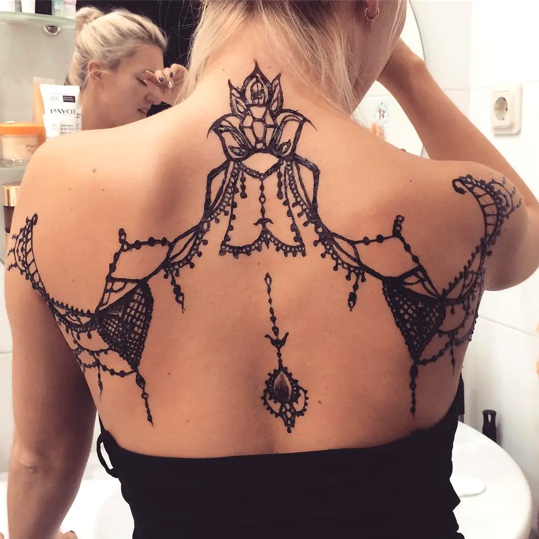 Intricate Floral Lace Upper Back Tattoo