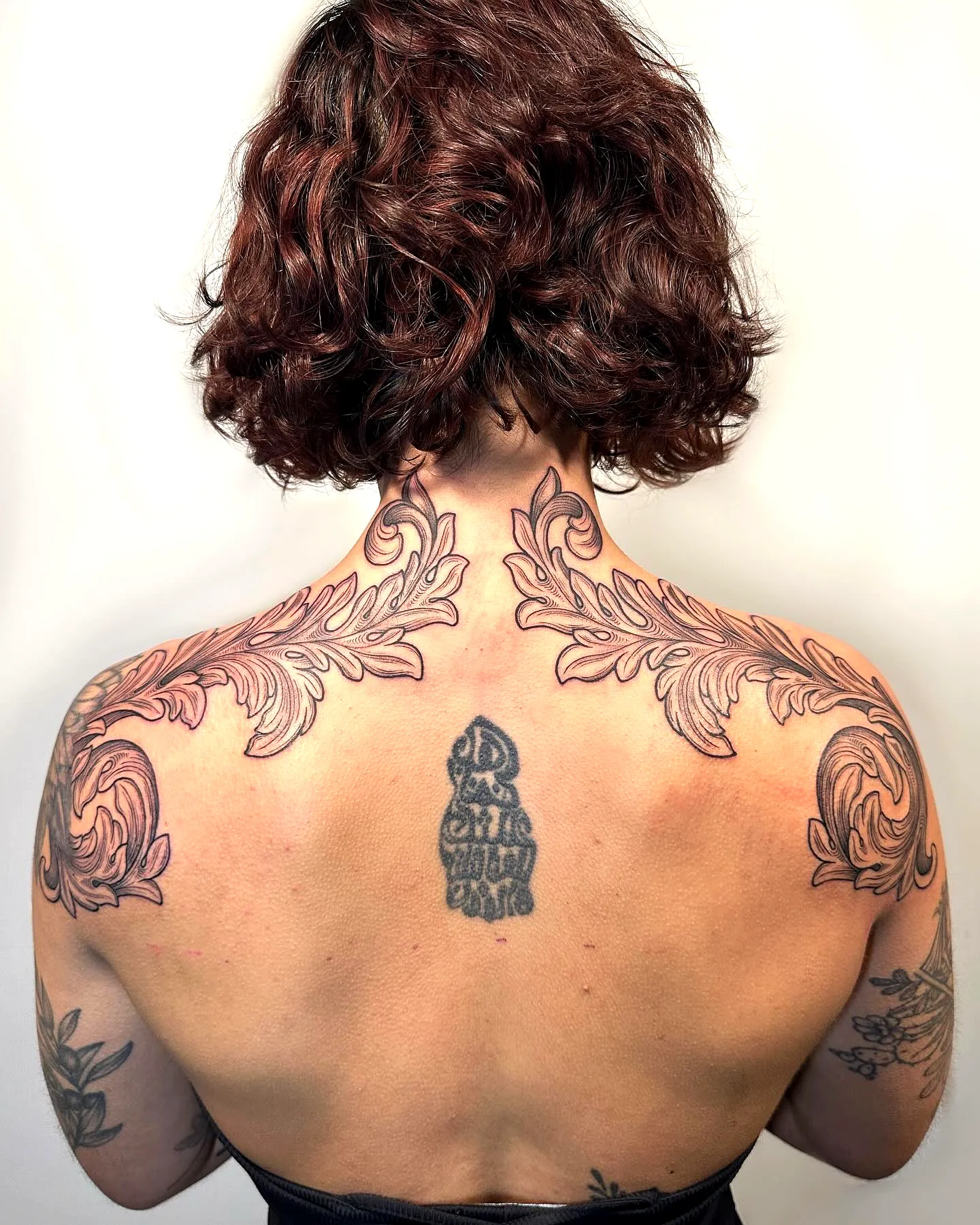 Intricate Floral Shoulder Tattoo Design