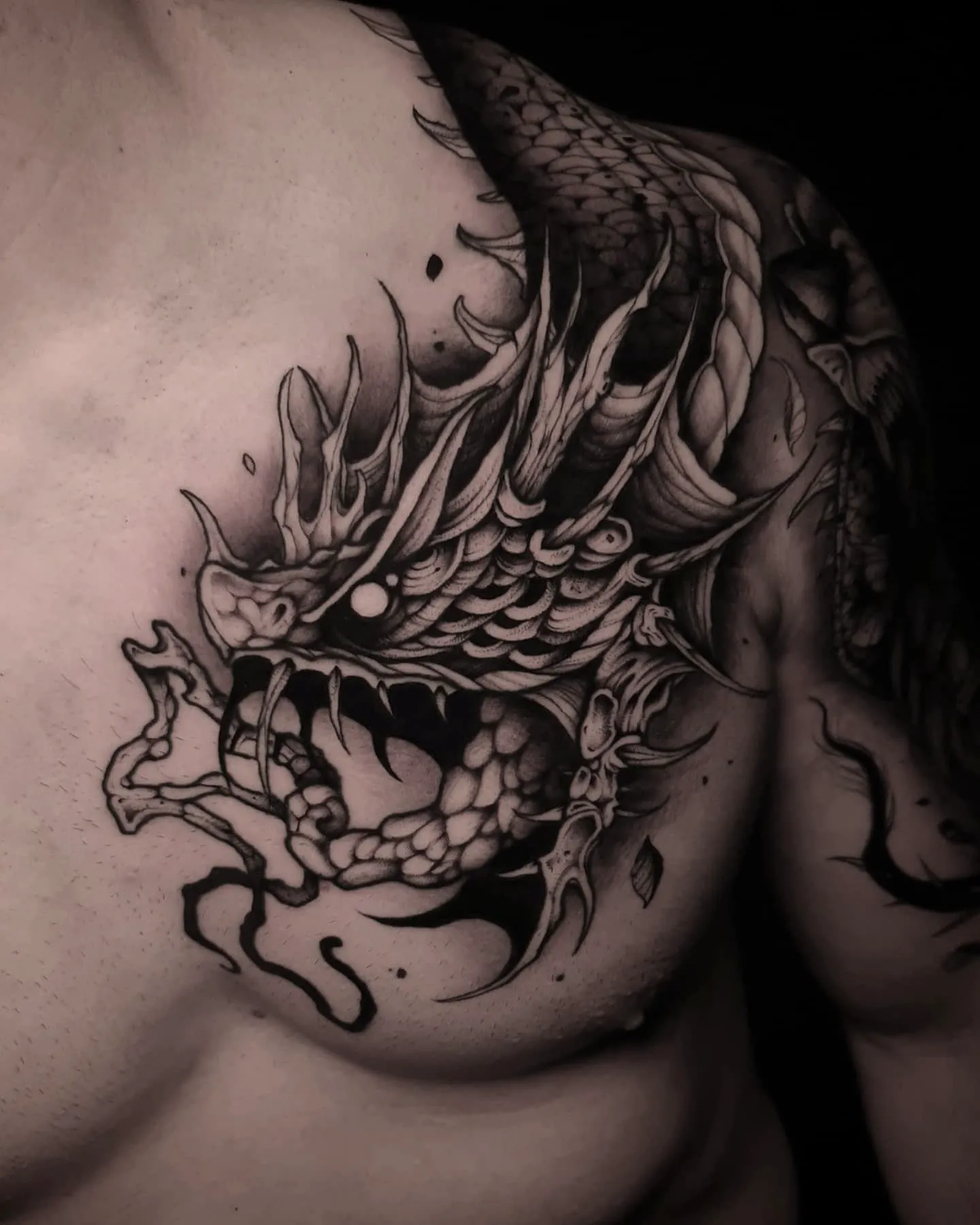 Intricate Jormungandr Chest Tattoo