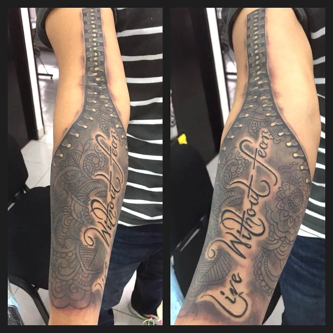 Intricate Spine Forearm Tattoo