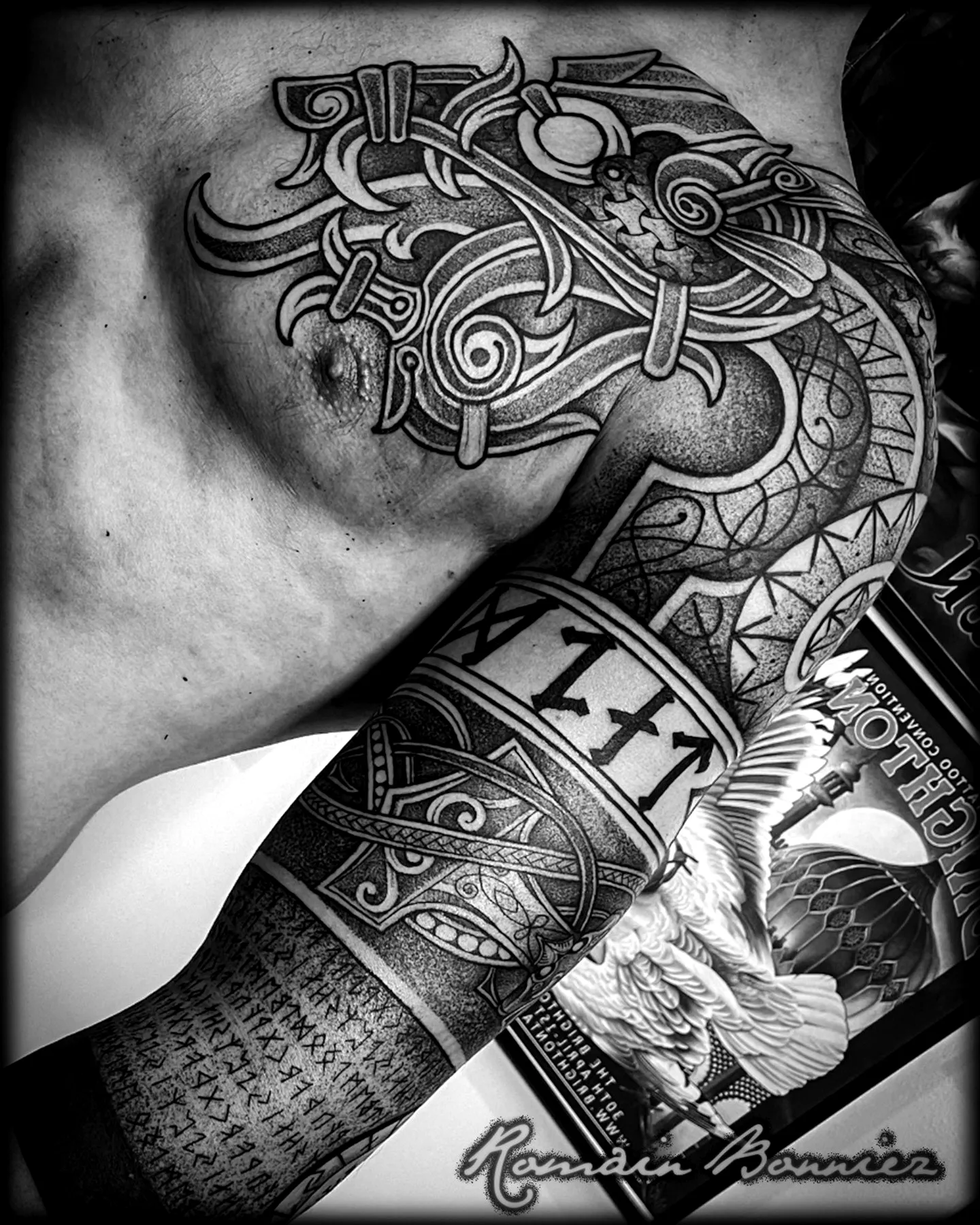 Intricate Tribal Upper Arm Tattoo
