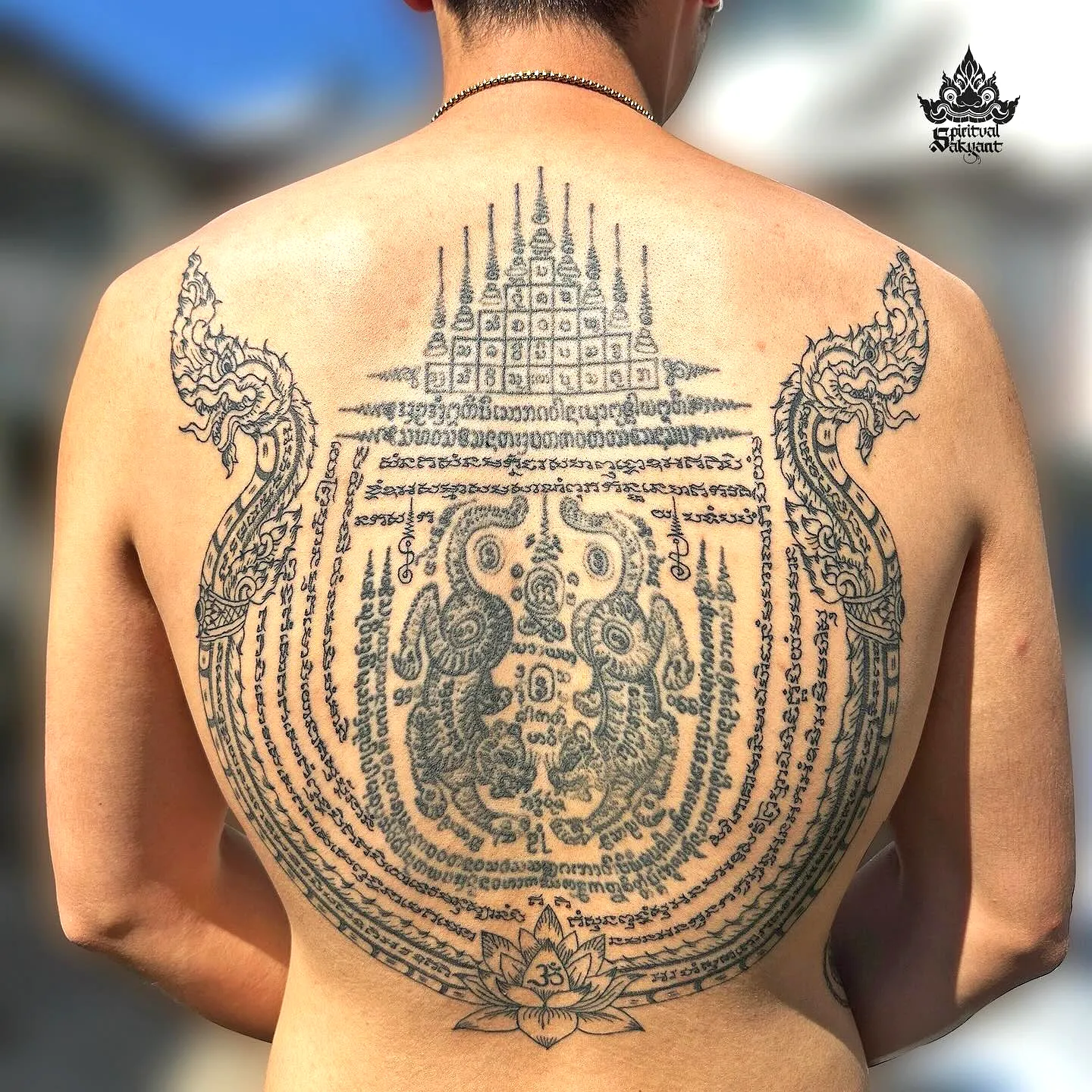 Intricate Upper Back Tattoo Design