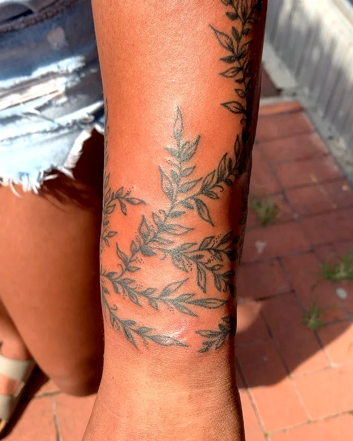 Intricate Vines Forearm Tattoo