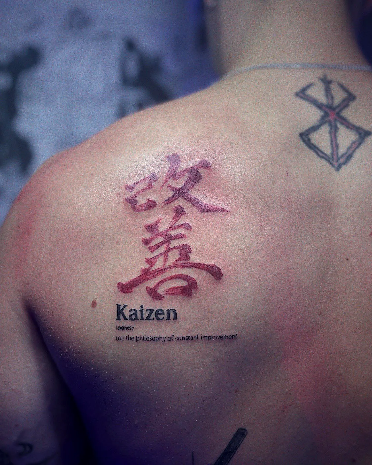 Kaizen Upper Back Tattoo in Deep Red