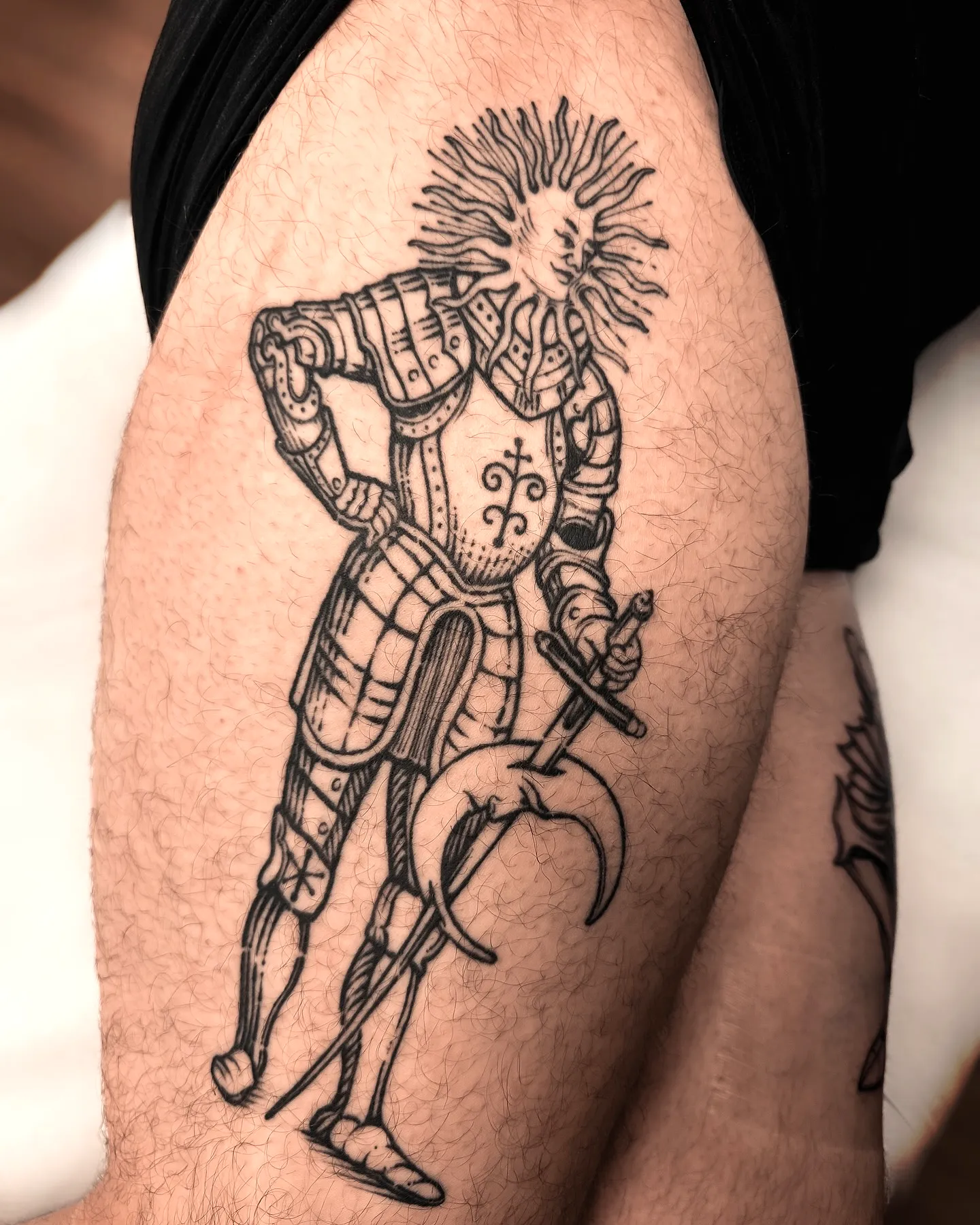 Knight Thigh Tattoo in Black Ink