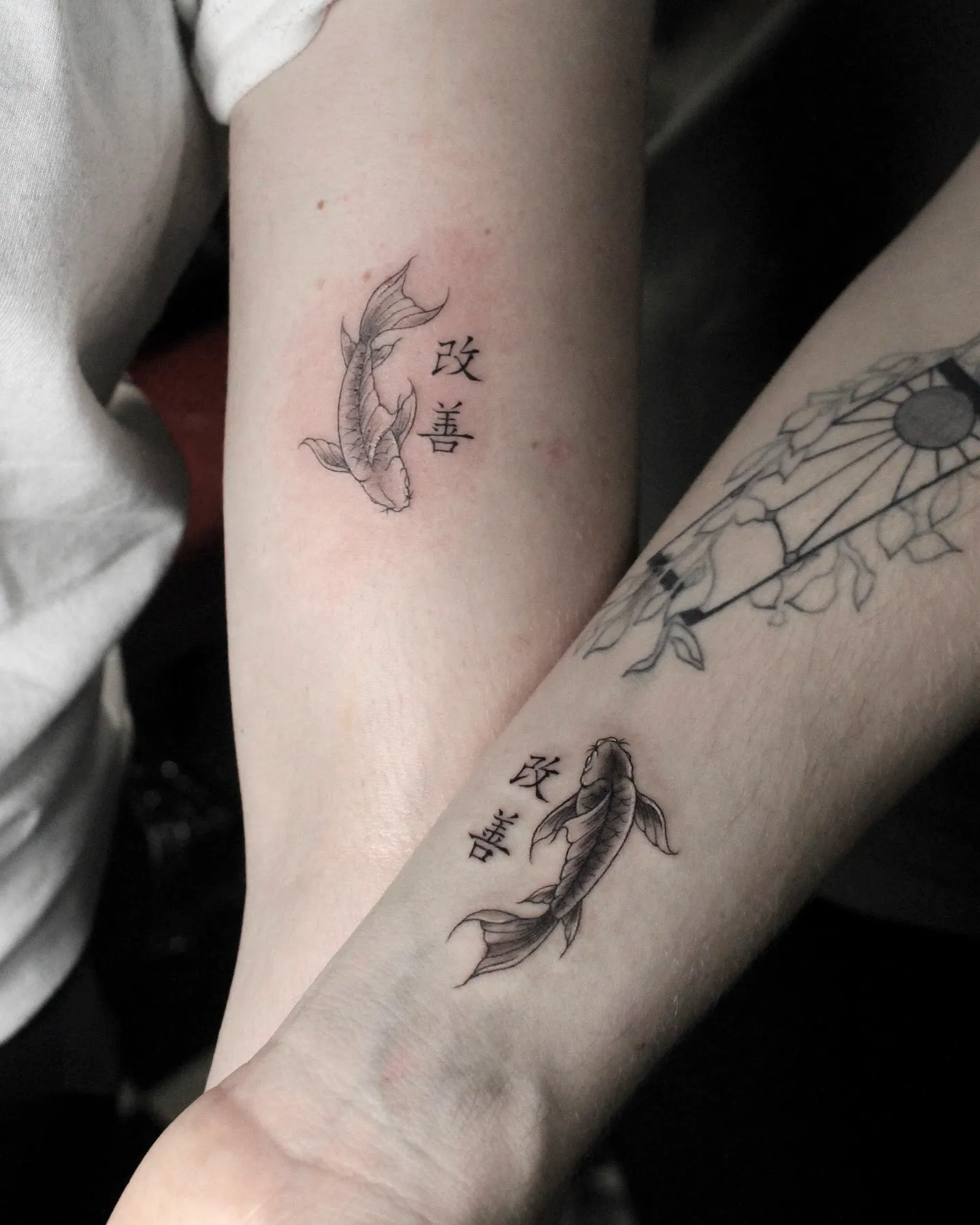 Koi Fish Forearm Kaizen Tattoo