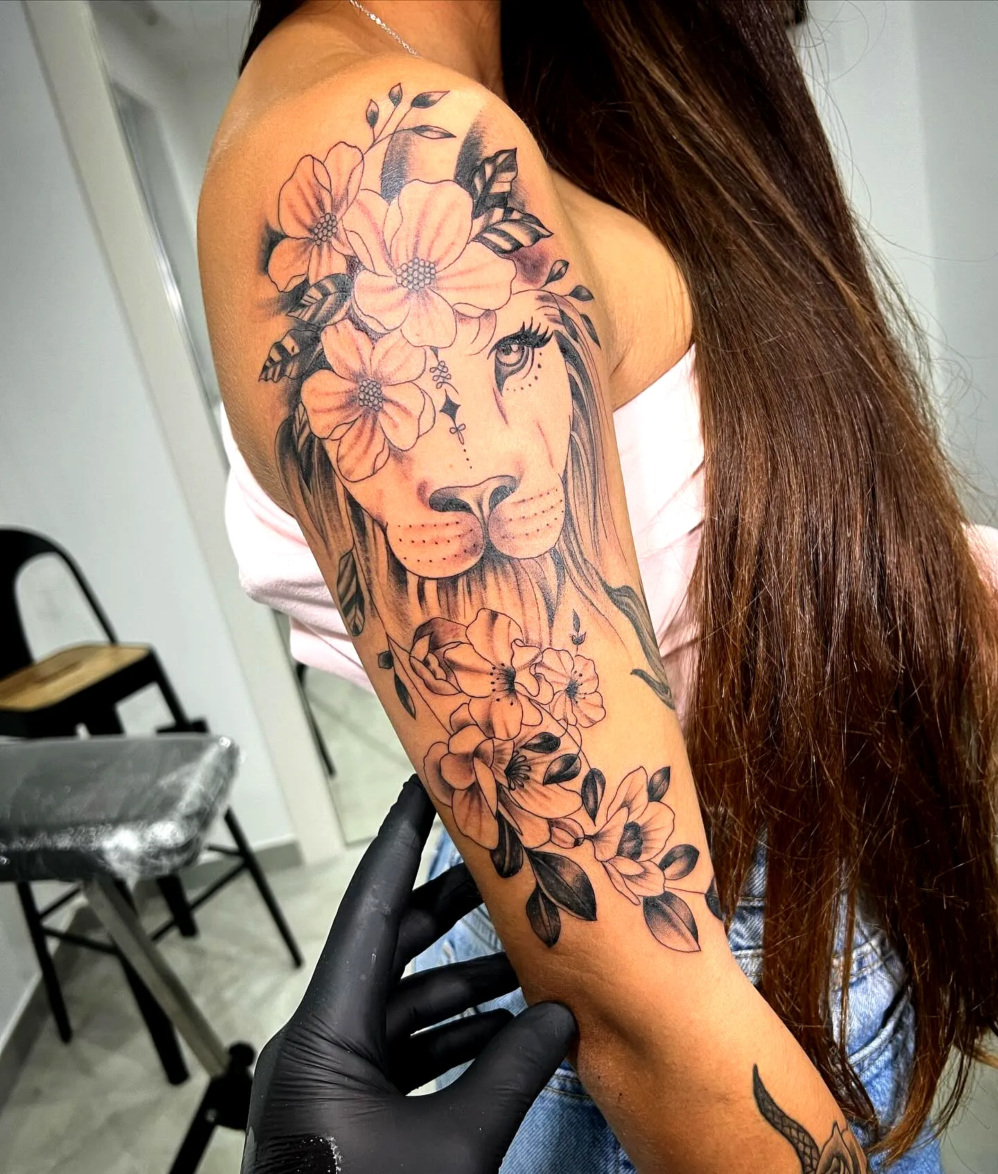 Lions Face Floral Crown Upper Arm Tattoo