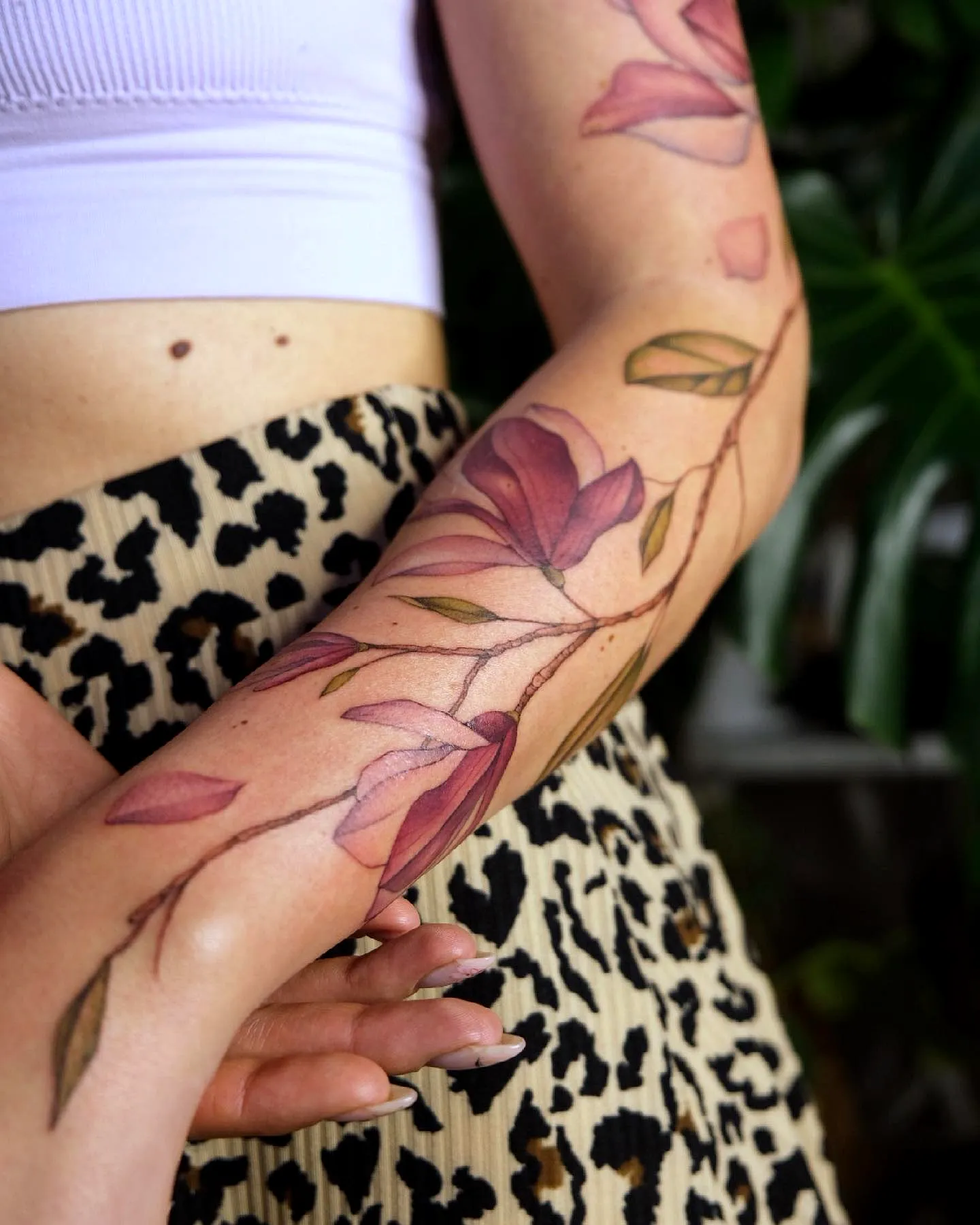 Magnolia Forearm Tattoo in Pink and Green