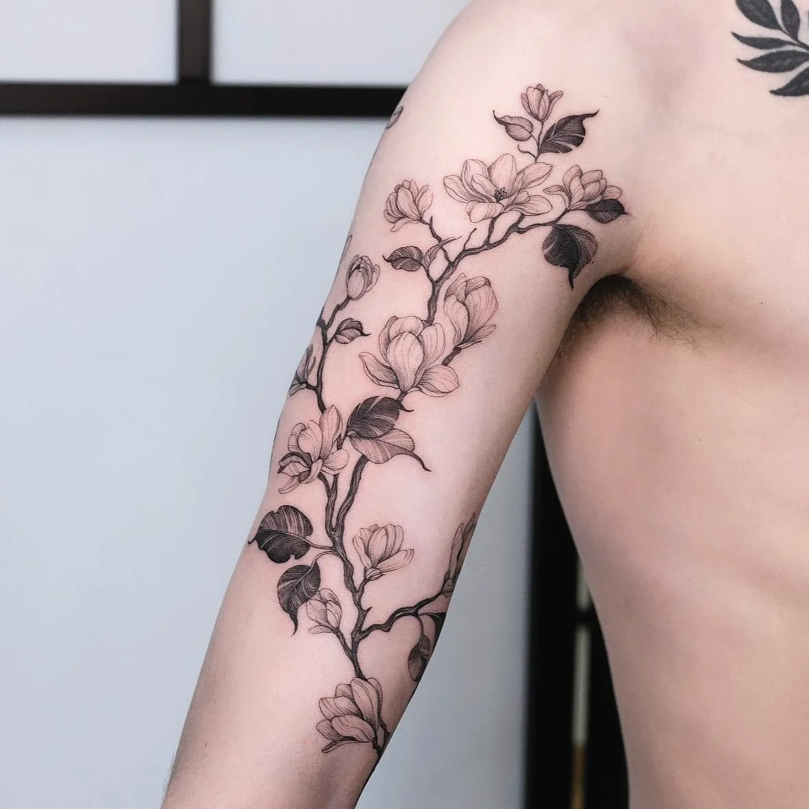 Magnolia Upper Arm Tattoo Design