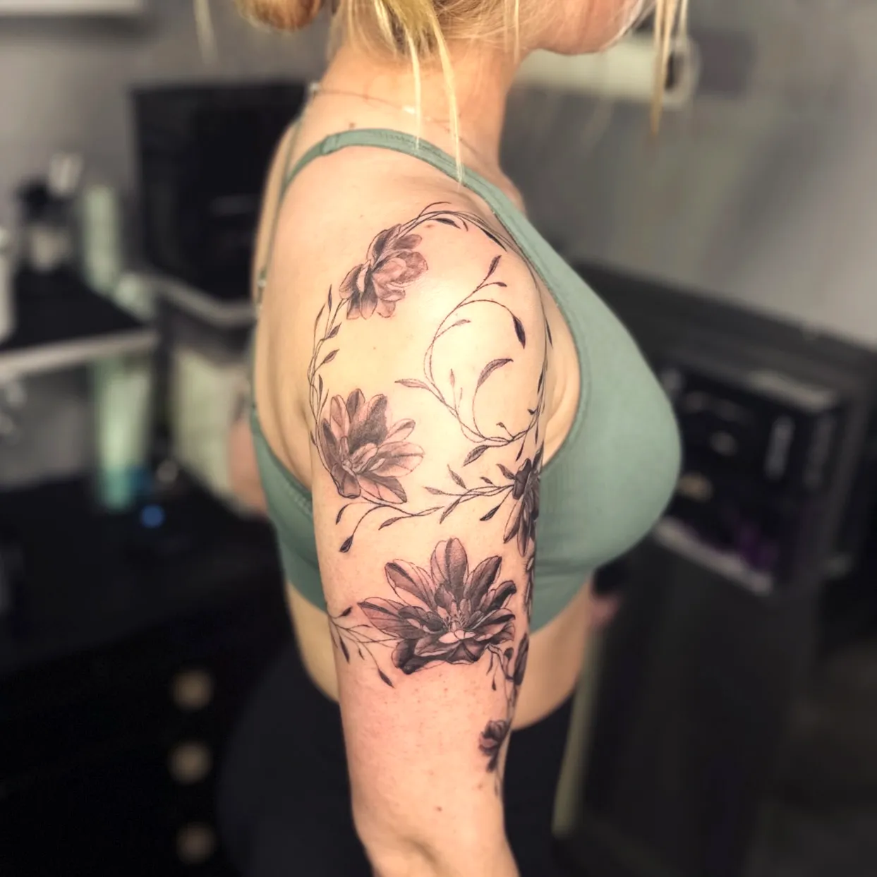 Magnolia Upper Arm Tattoo Elegant Line Work