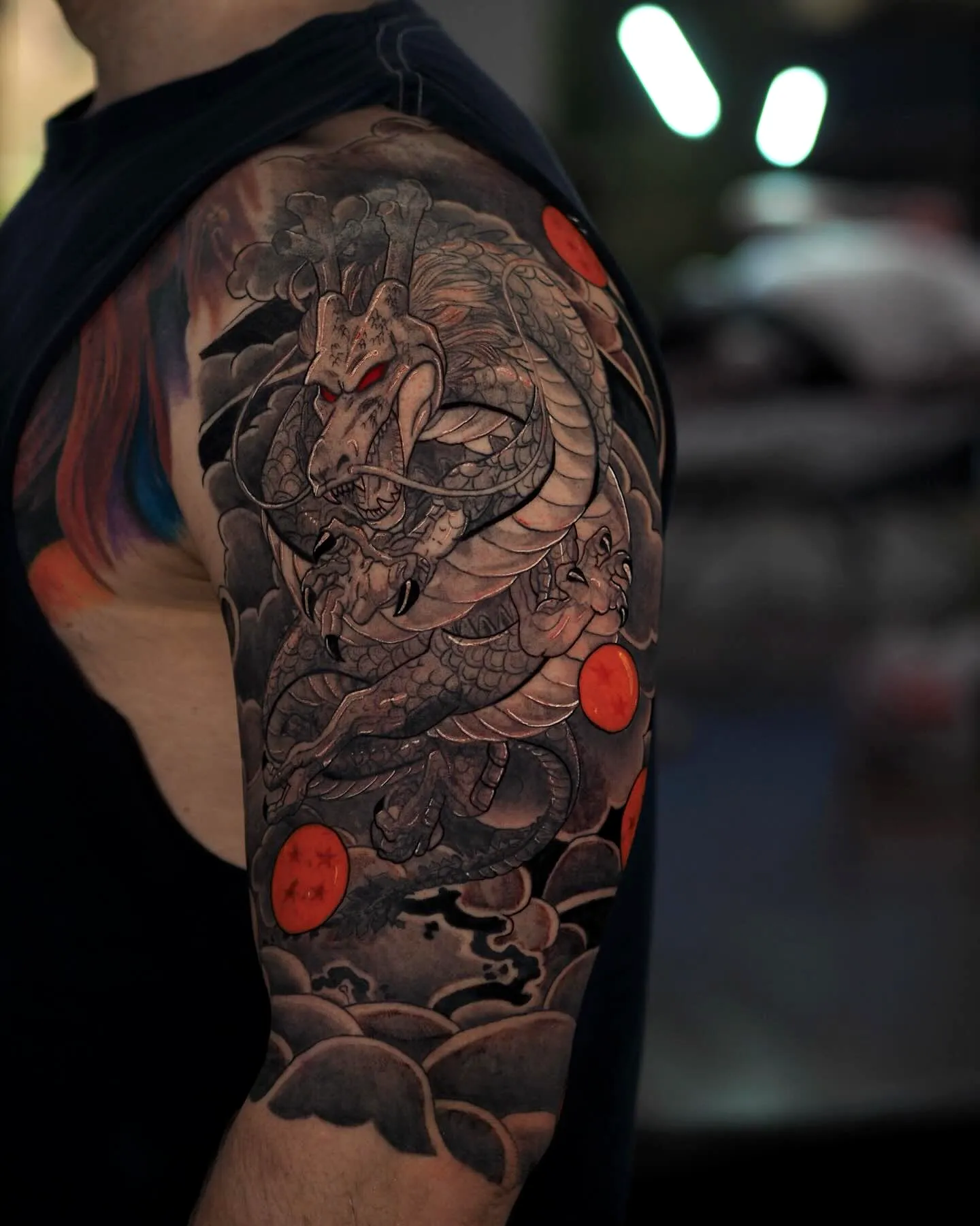 Majestic Dragon Tiger Upper Arm Tattoo