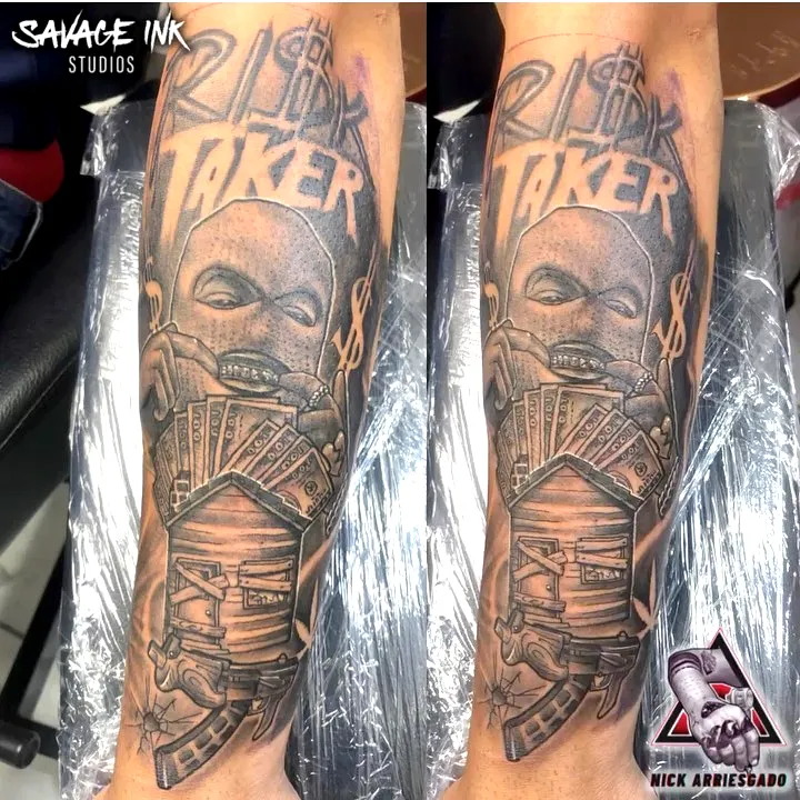 Masked Figure Forearm Tattoo