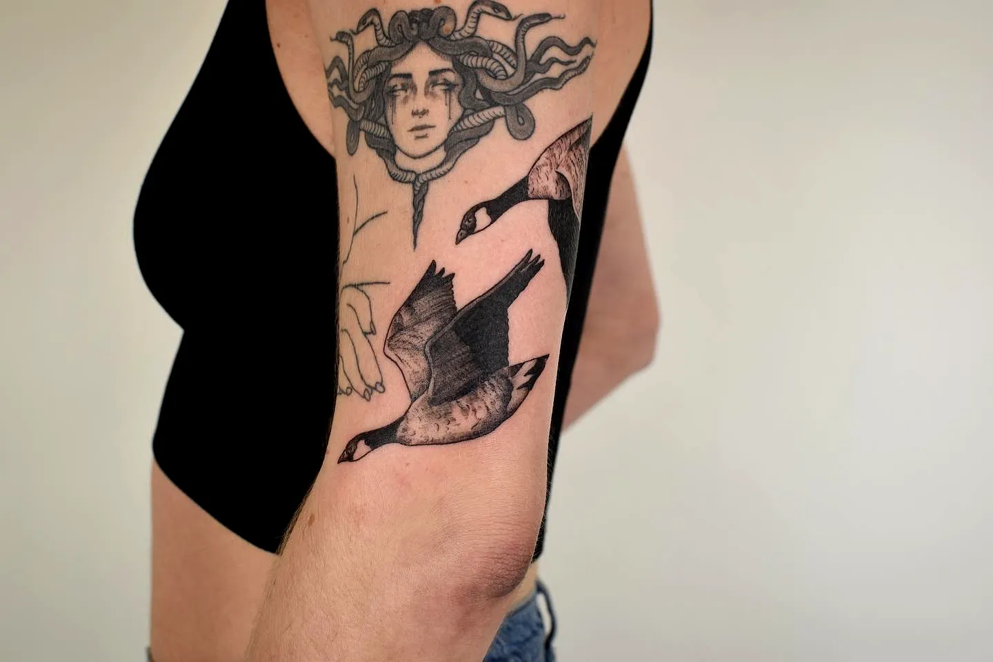 Medusa Upper Arm Tattoo with Geese