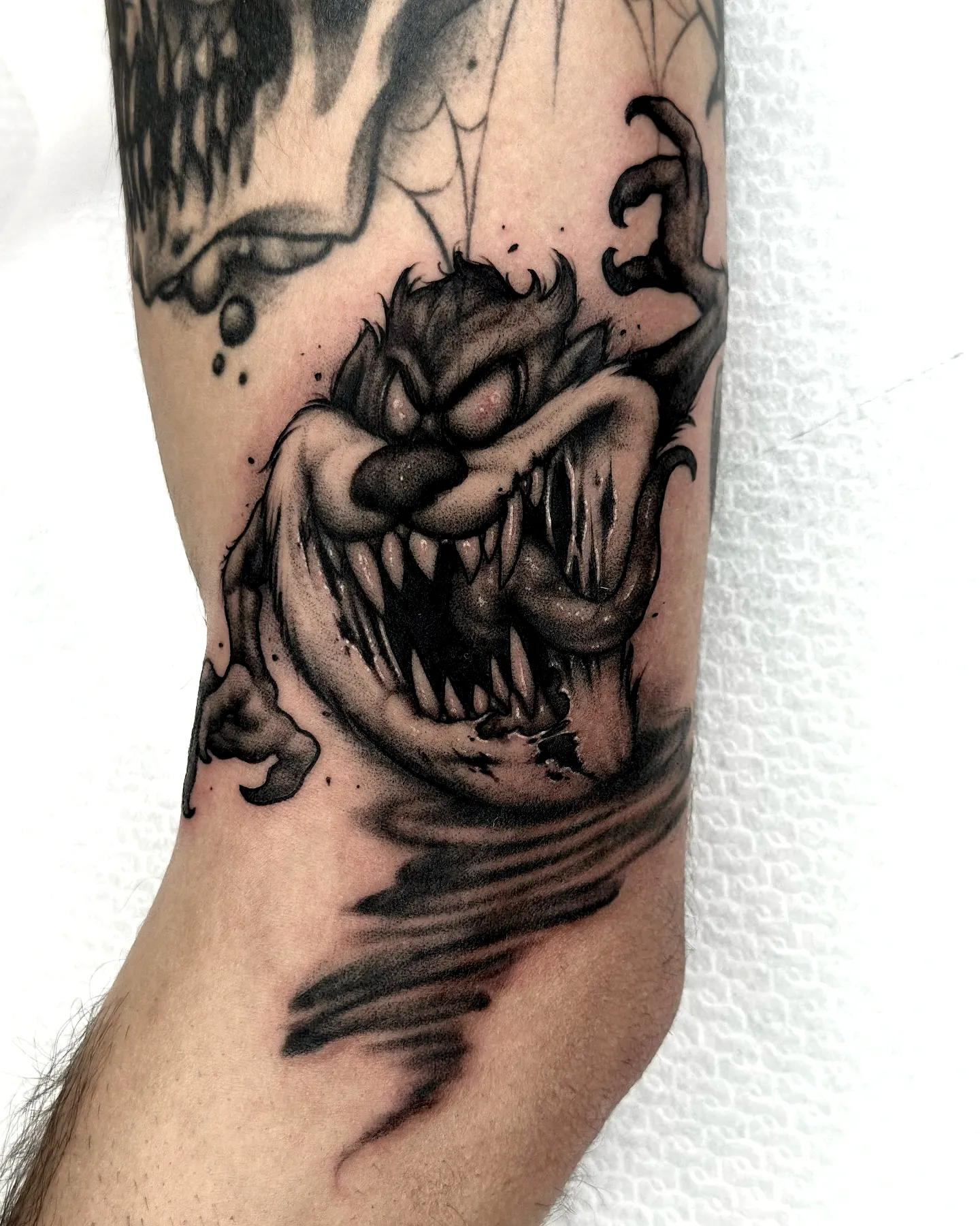 Menacing Creature Forearm Taz Tattoo