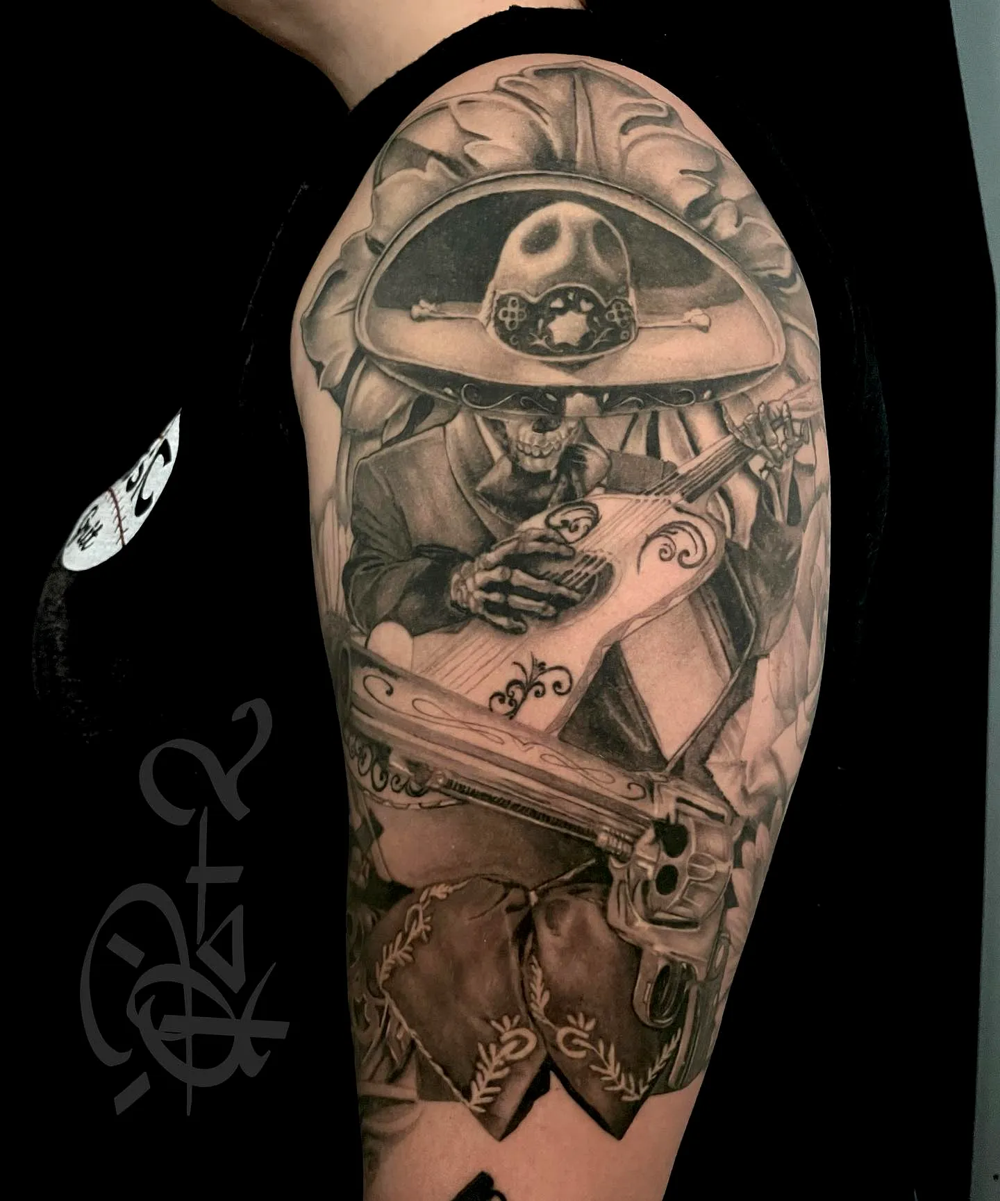 Mexican Skeleton Upper Arm Tattoo