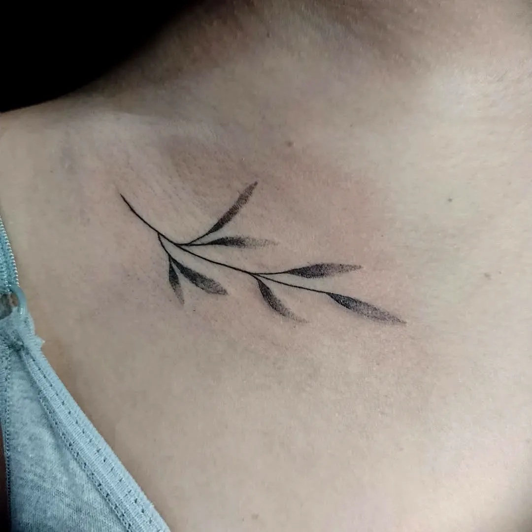 Minimalist Branch Collarbone Tattoo