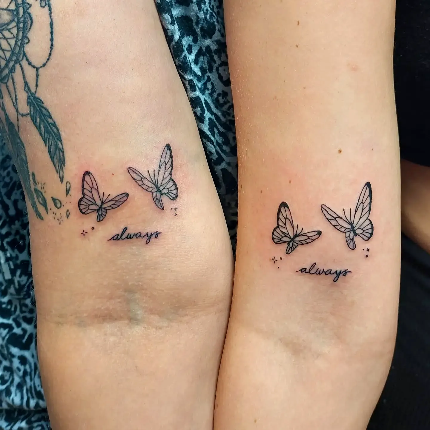 Minimalist Butterfly Wrist Tattoo