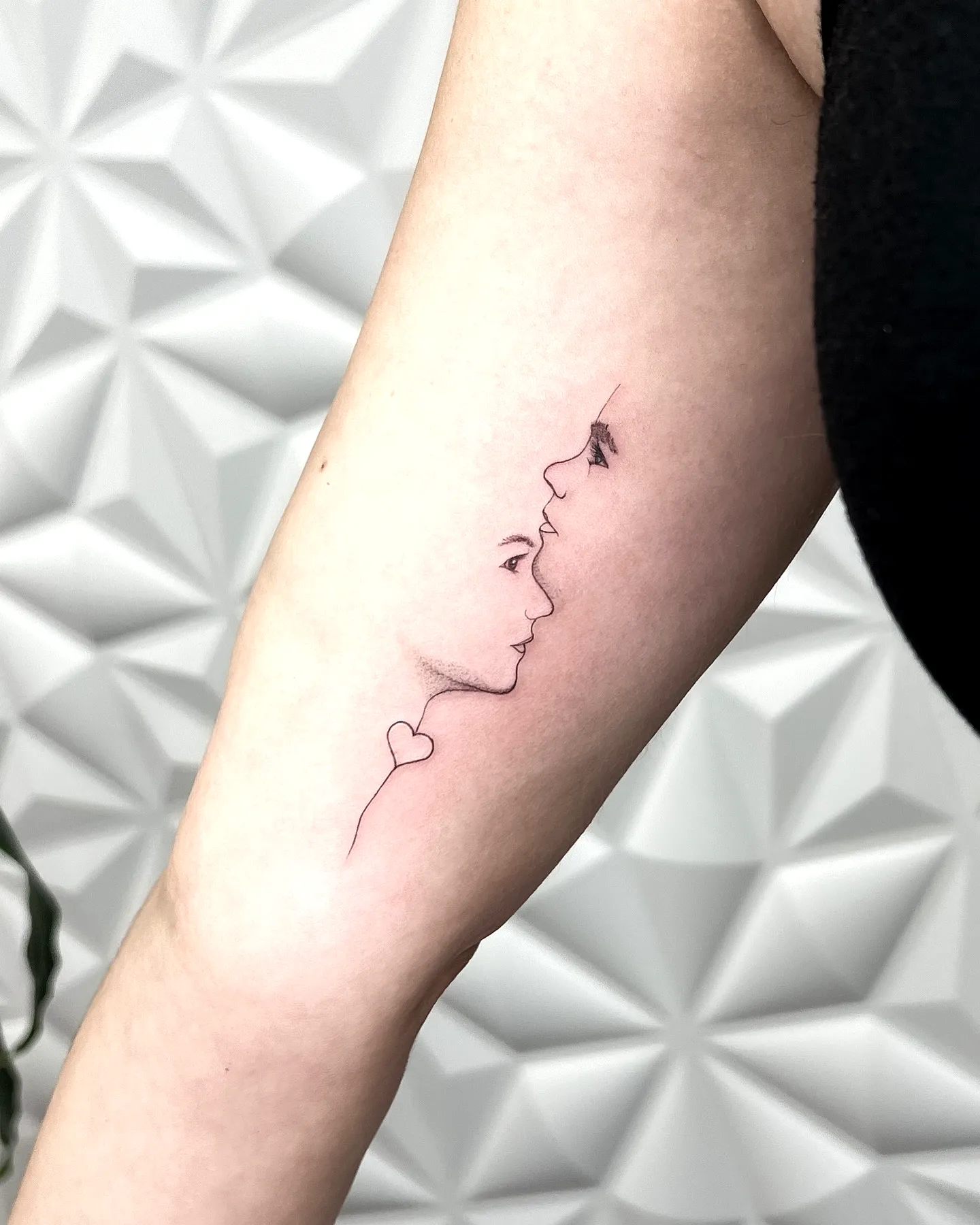 Minimalist Face Forearm Tattoo