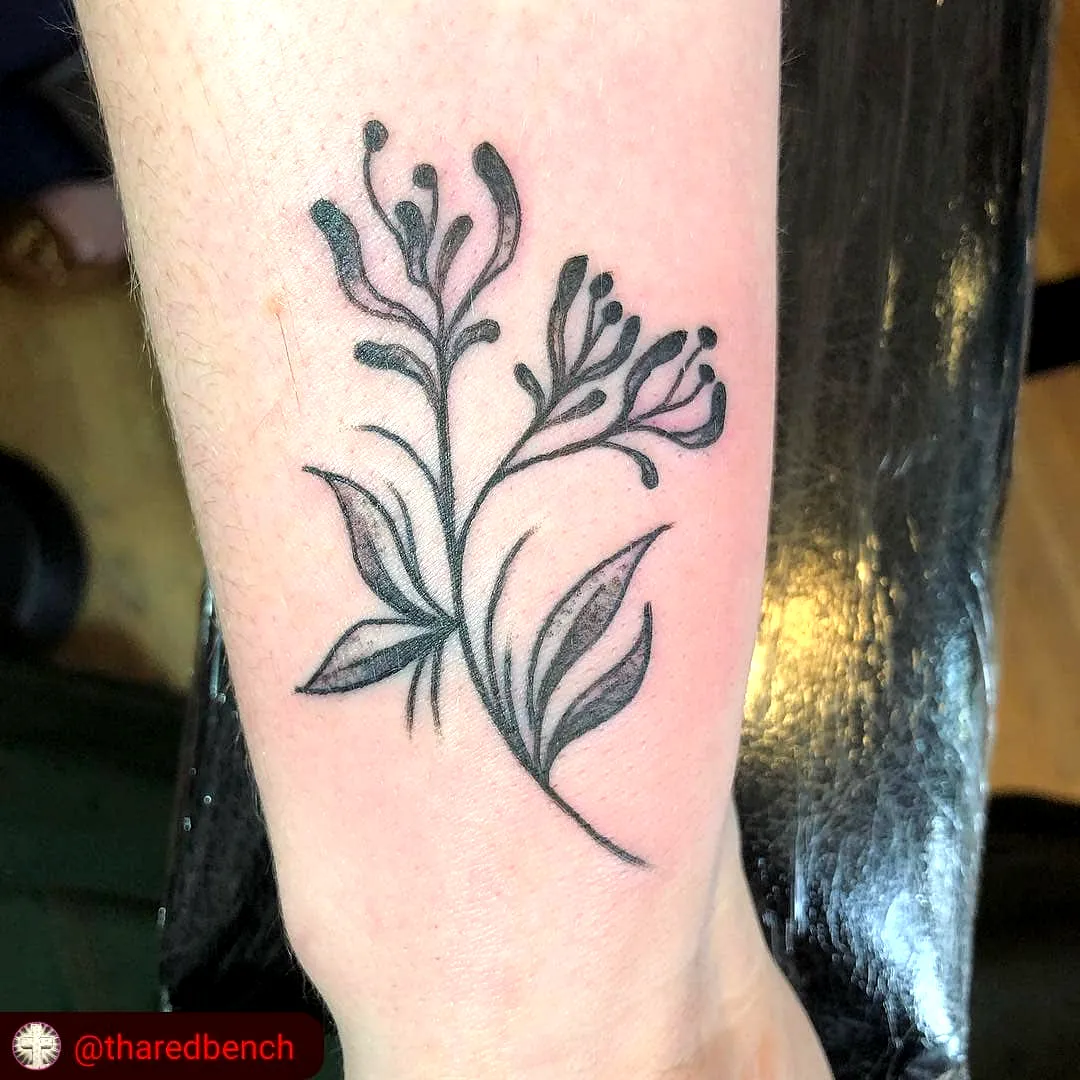 Minimalist Floral Forearm Tattoo