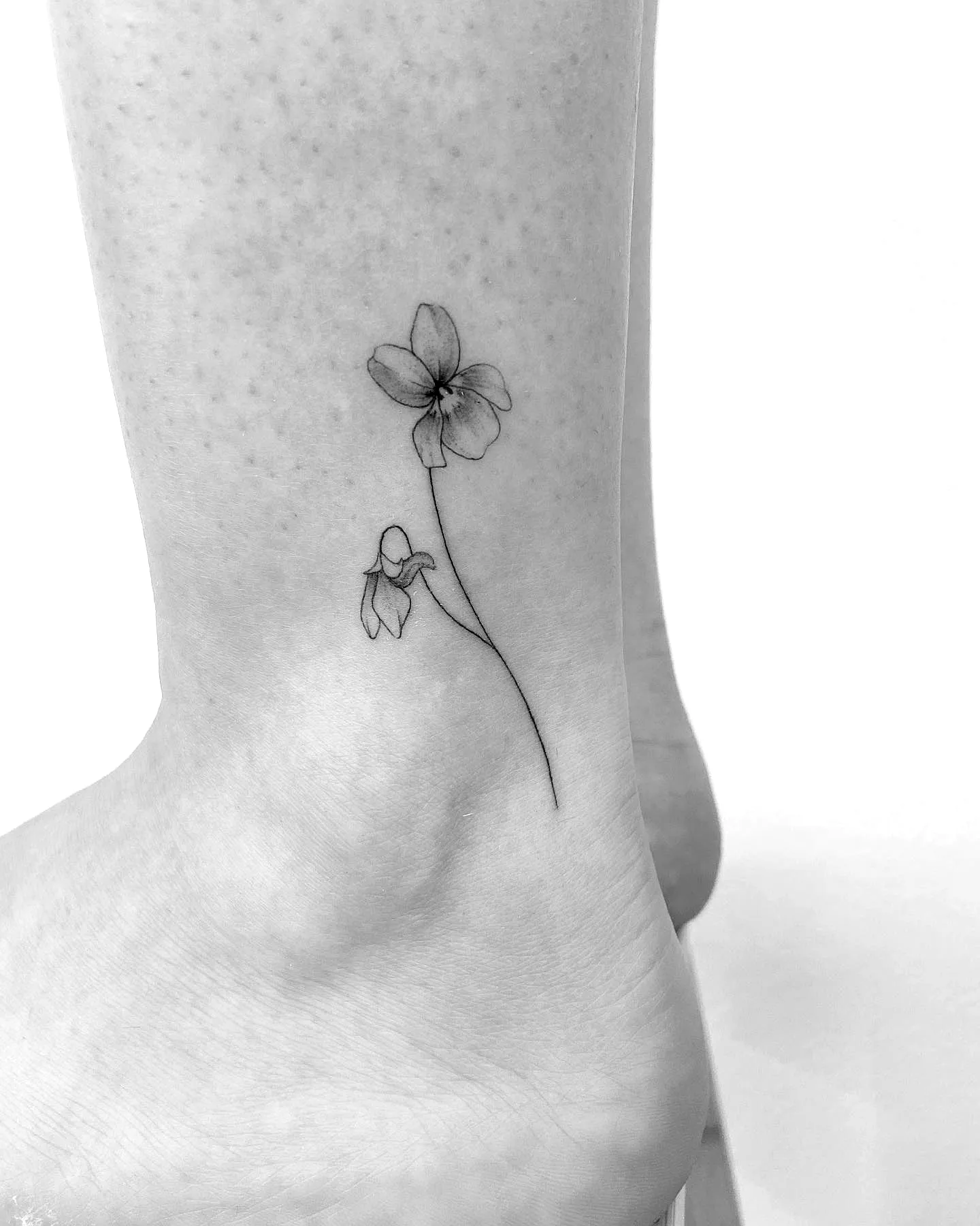 Minimalist Flower Ankle Tattoo
