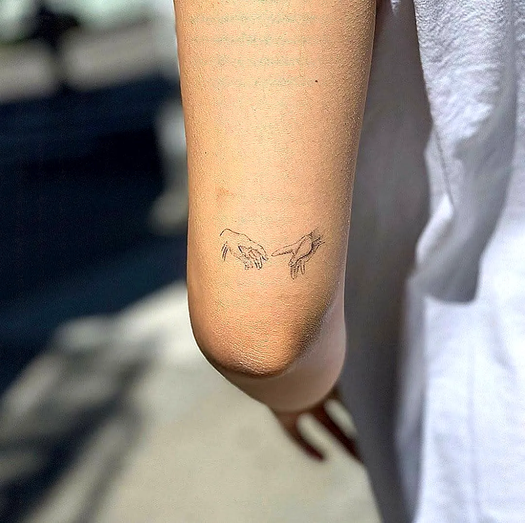 Minimalist Hands Forearm Tattoo