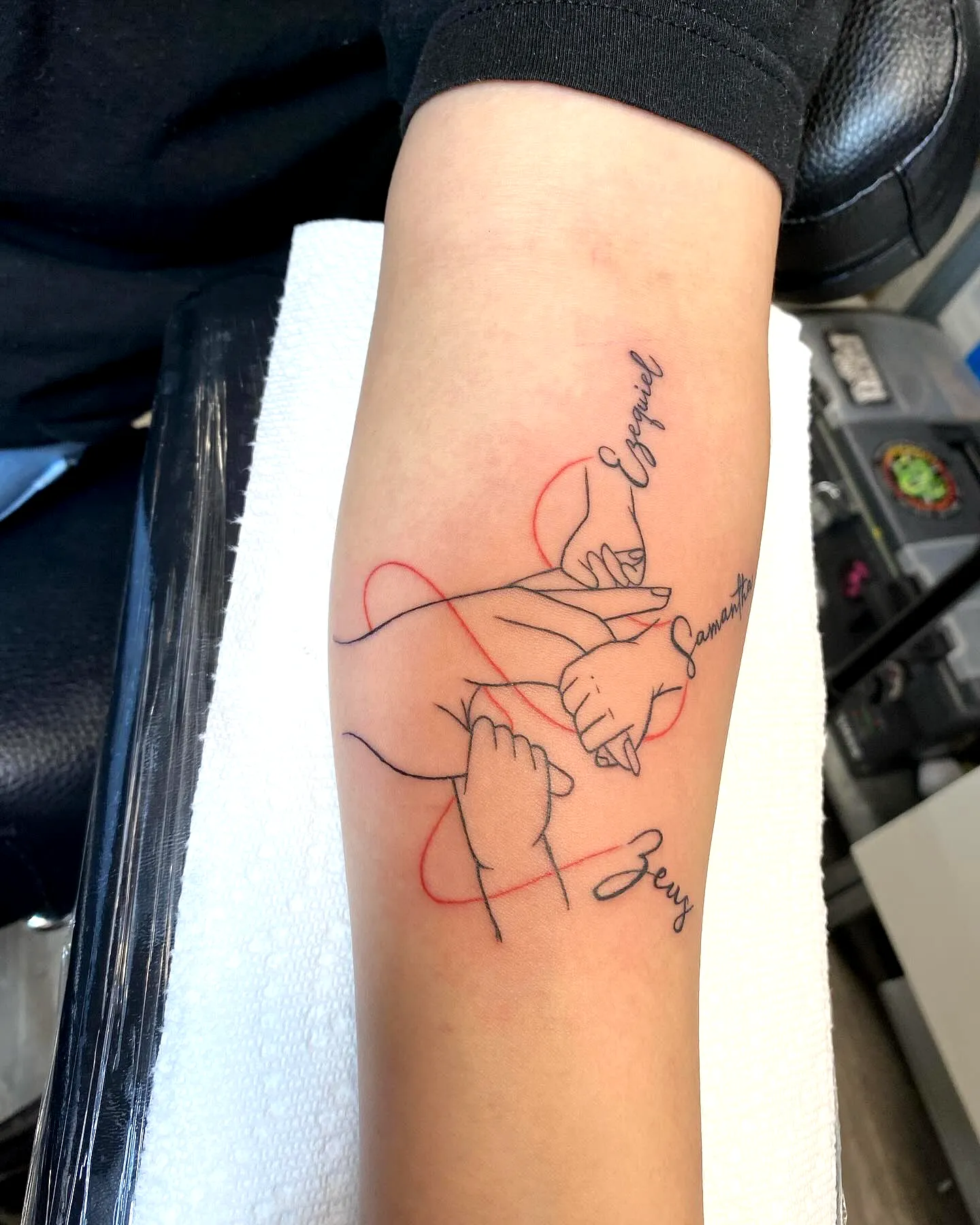 Minimalist Interlocking Hands Forearm Tattoo