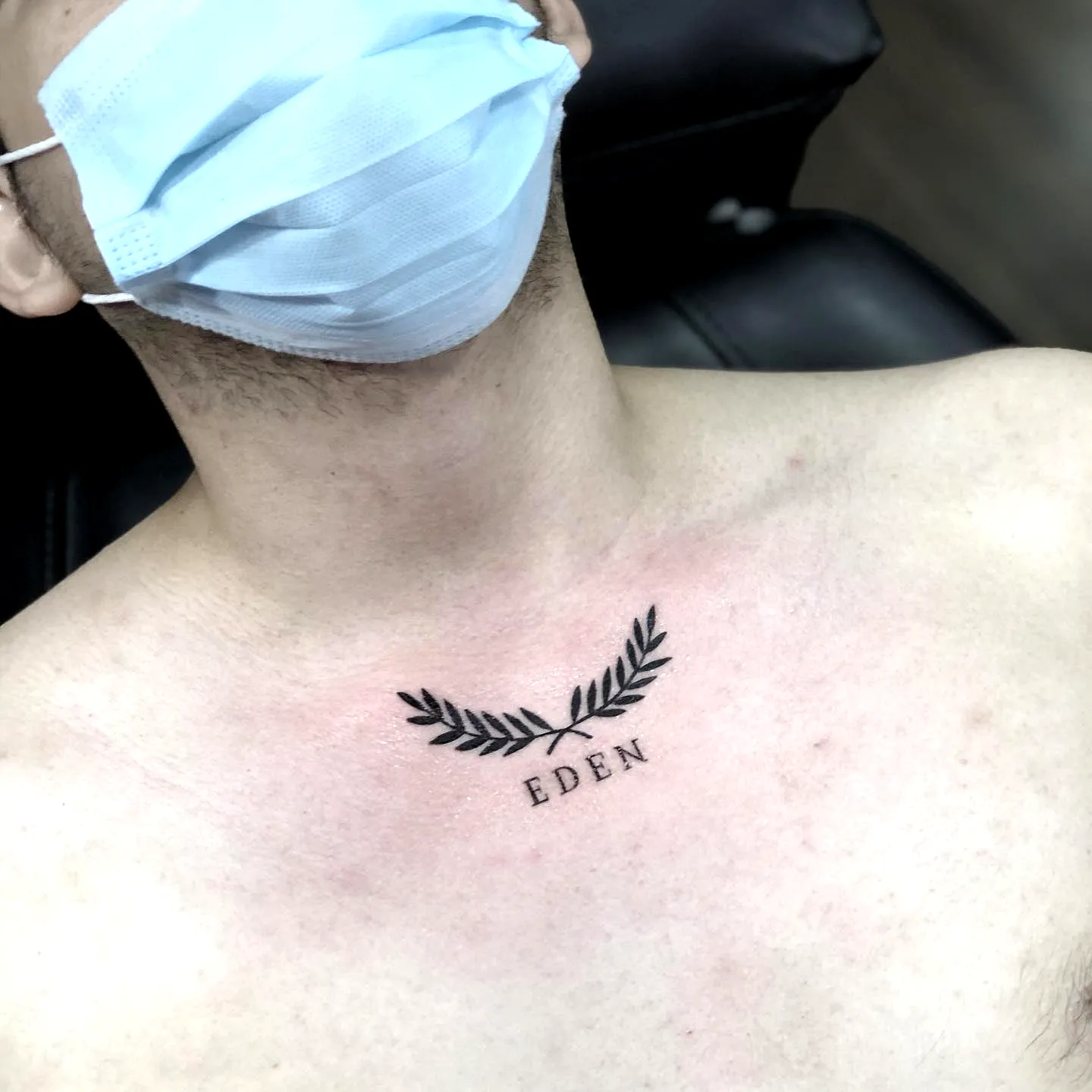 Minimalist Laurel Wreath Chest Tattoo