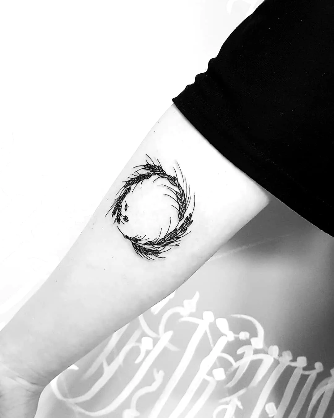 Minimalist Leaves Forearm Tattoo