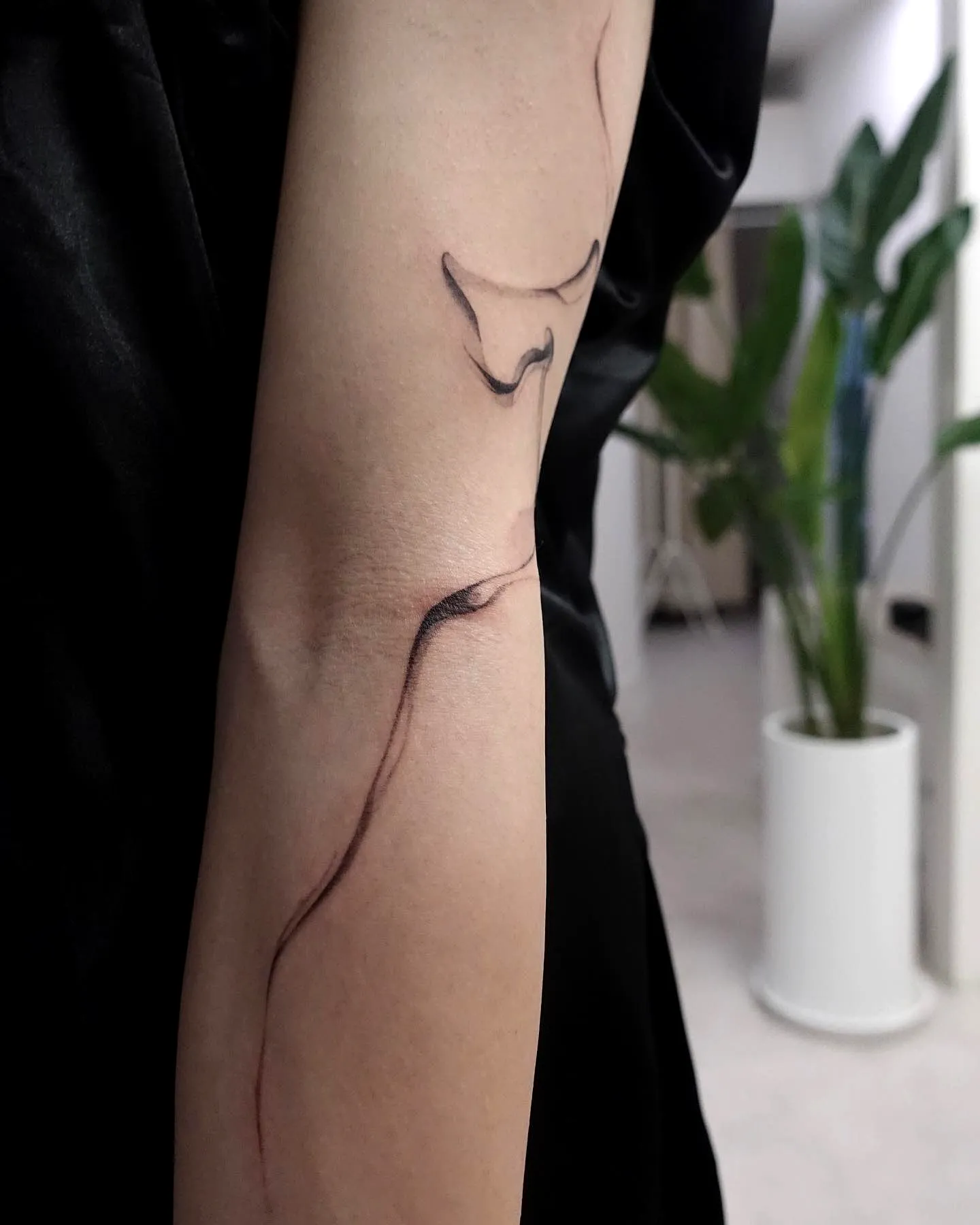 Minimalist Line Art Forearm Tattoo