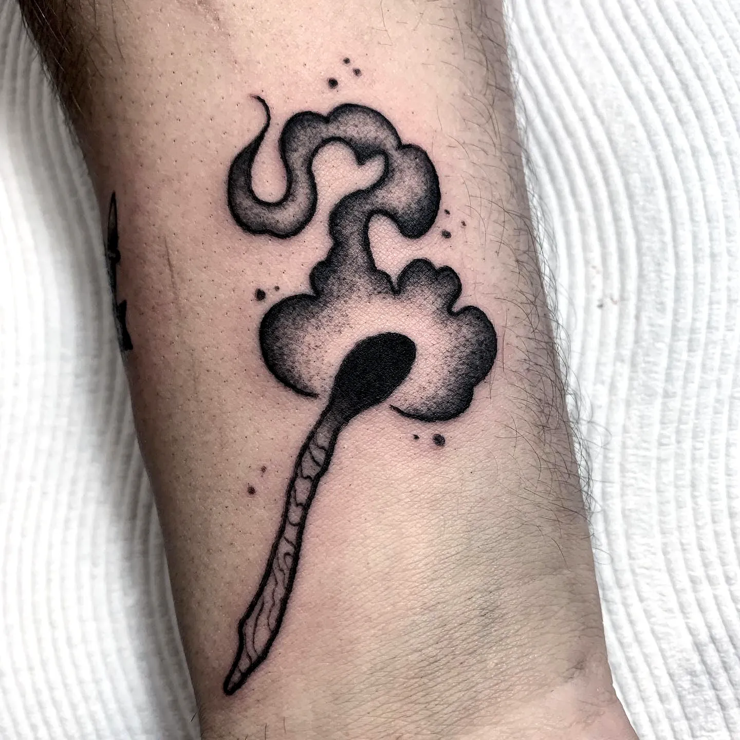 Minimalist Matchstick Forearm Tattoo