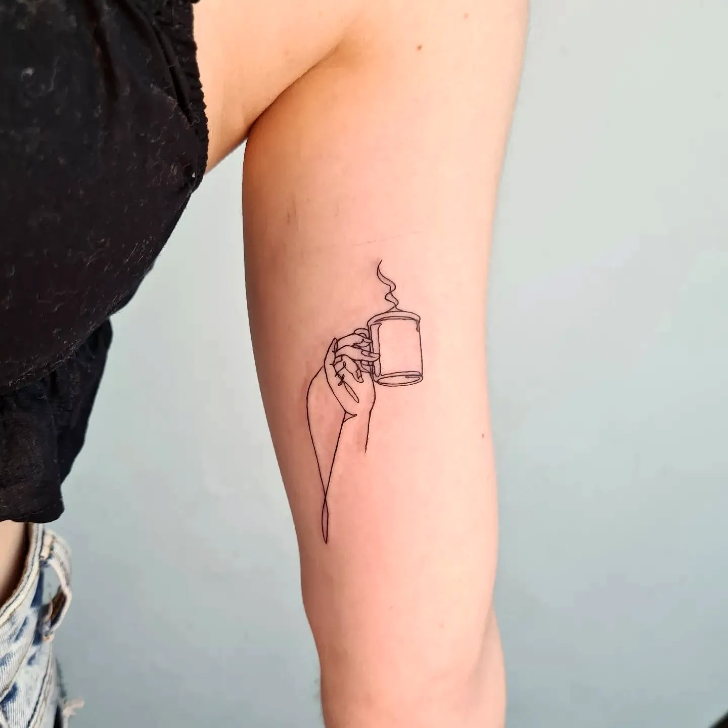 Minimalist Mug Inner Arm Tattoo