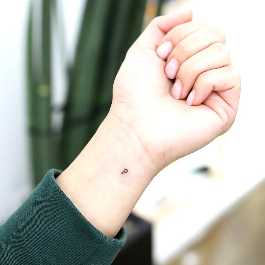 Minimalist P Wrist Tattoo Design