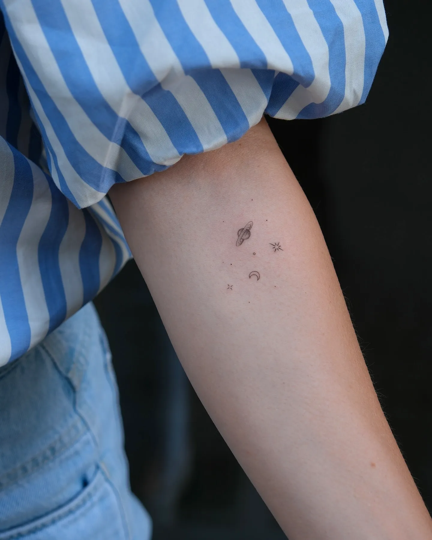 Minimalist Planet Arm Tattoo