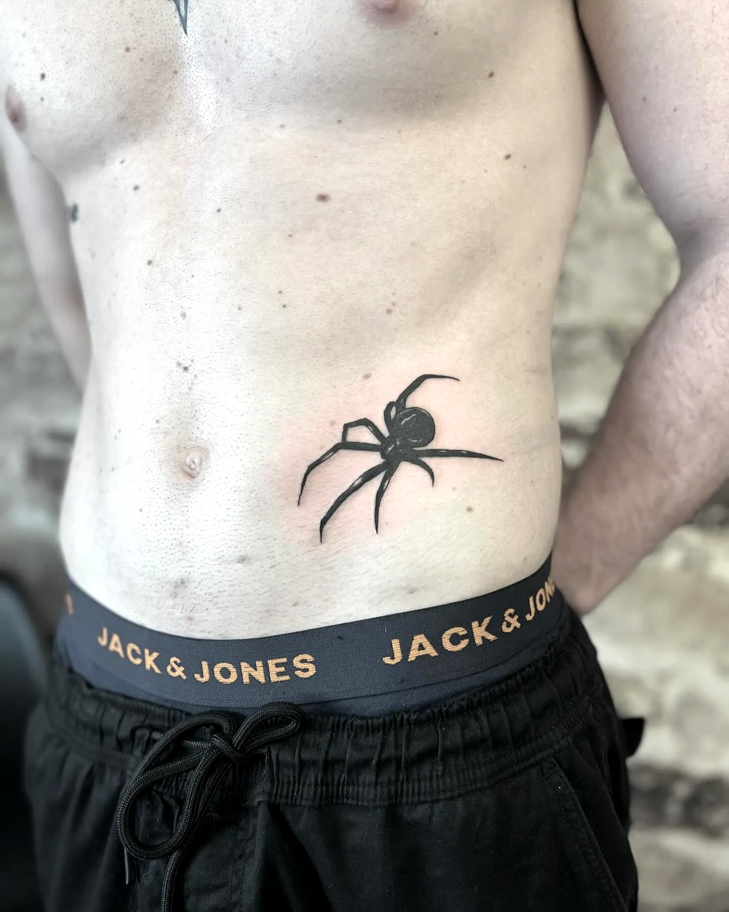 Minimalist Spider Side Tattoo