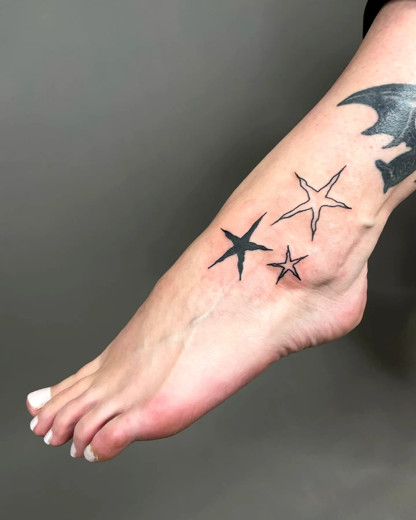 Minimalist Star Foot Tattoo Outline