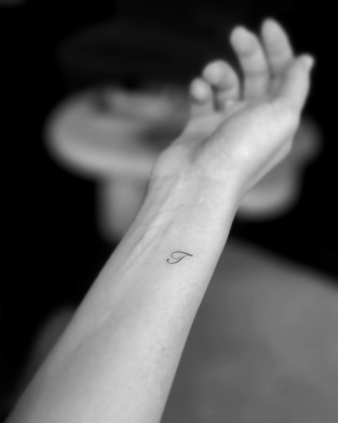 Minimalist T Forearm Tattoo in Black