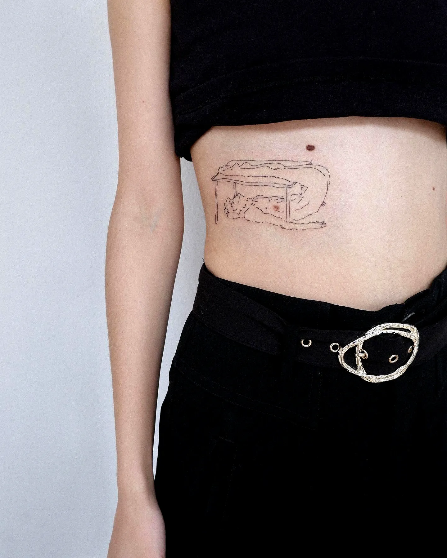 Minimalist Table Rib Tattoo