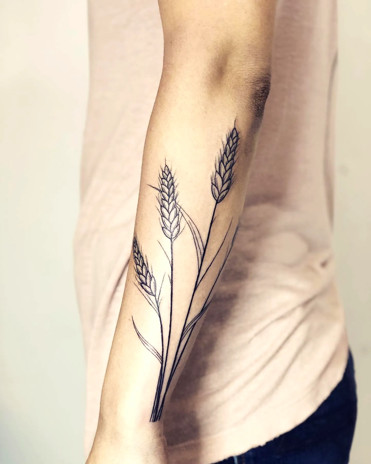 Minimalist Wheat Forearm Tattoo
