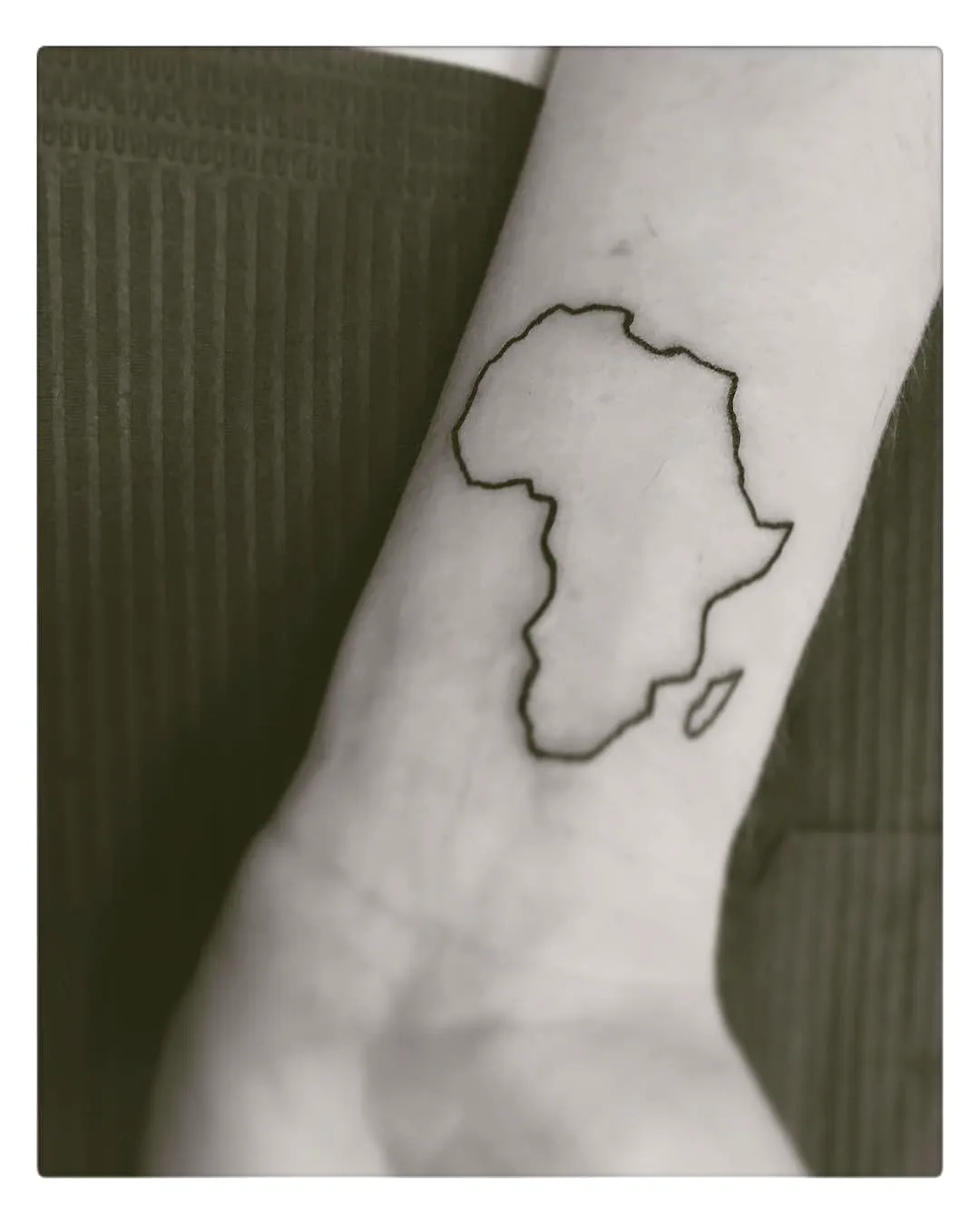 Minimalistic Africa Wrist Tattoo