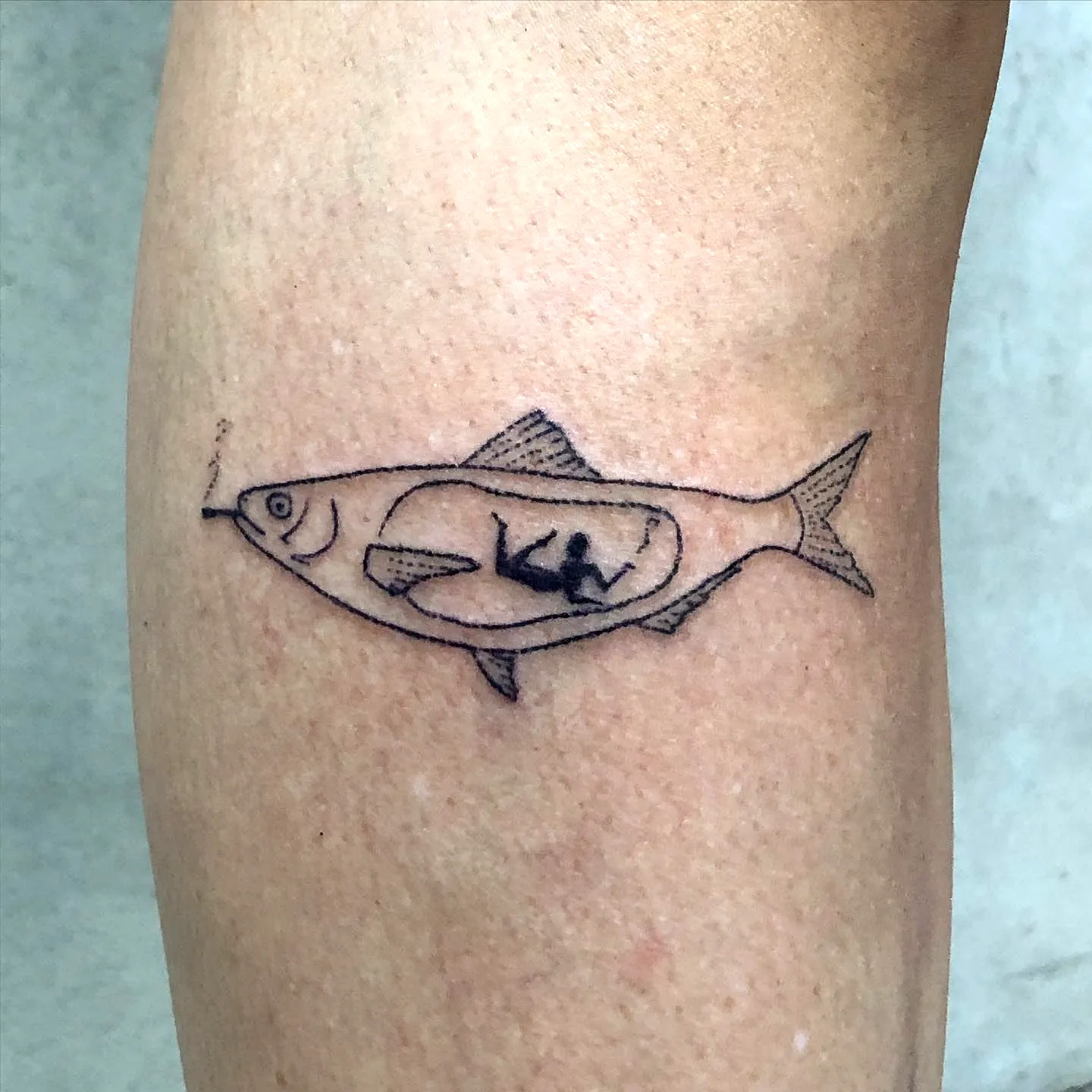Minimalistic Fish Forearm Tattoo