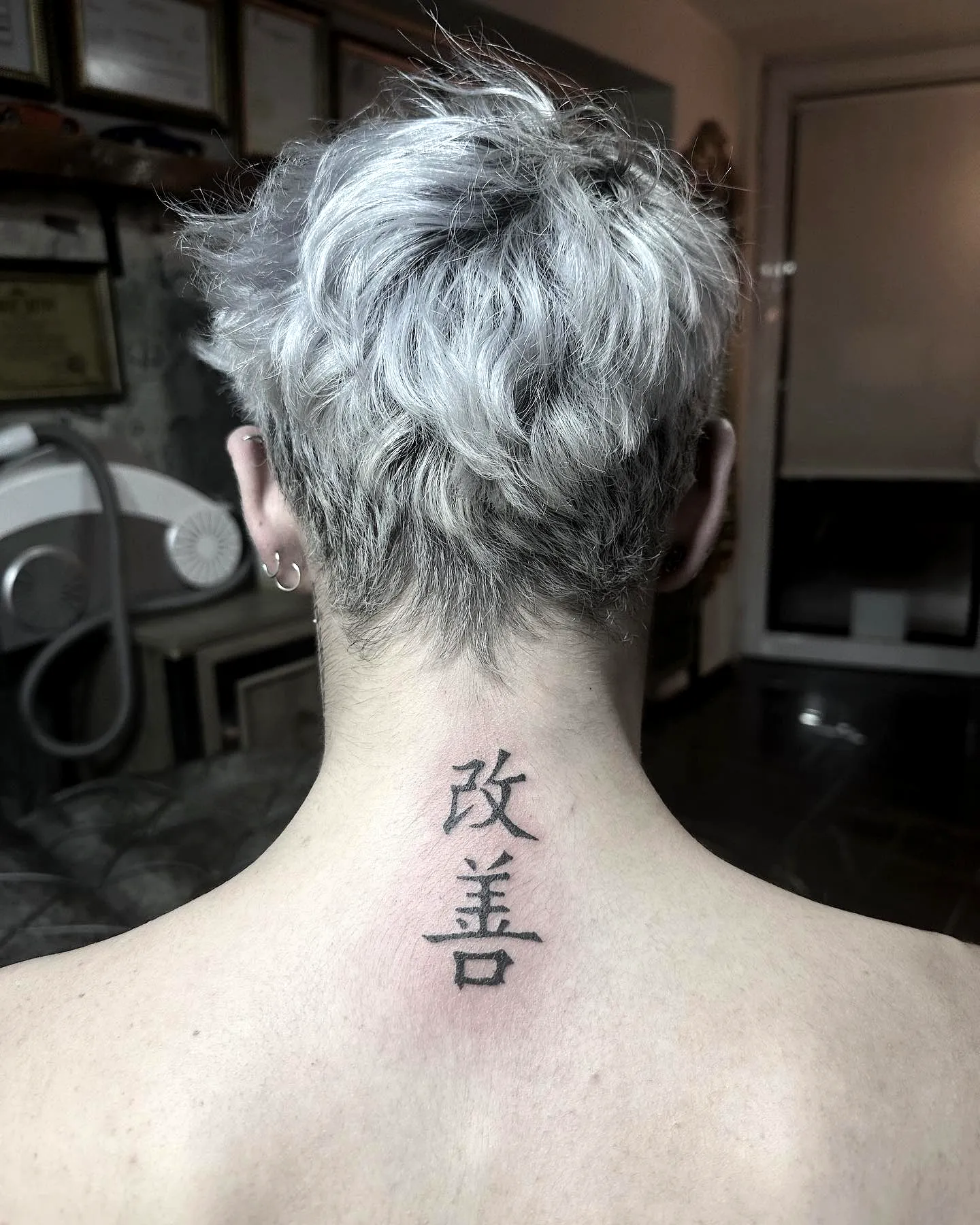 Minimalistic Japanese Characters Neck Tattoo