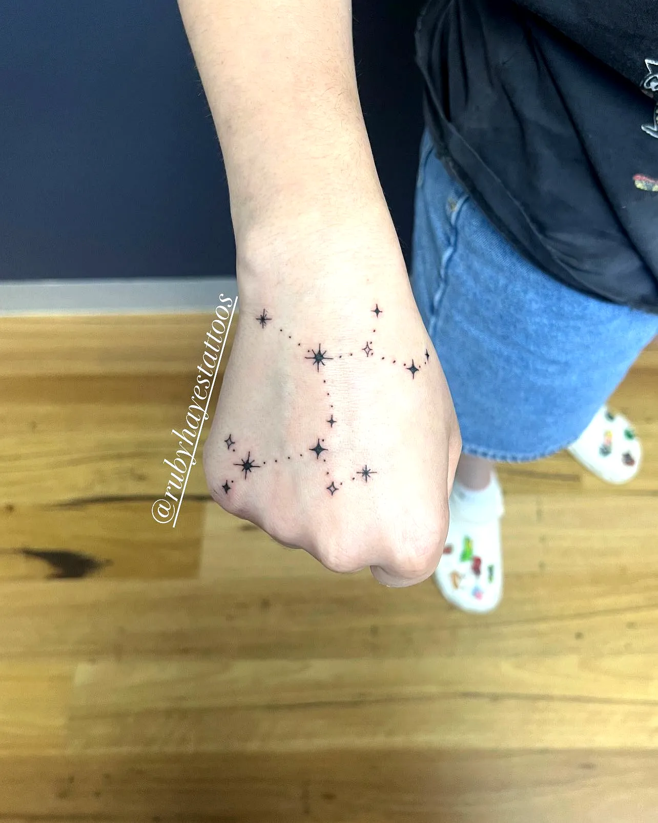 Minimalistic Sagittarius Hand Tattoo