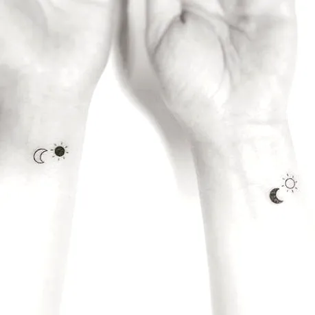 Minimalistic Sun and Moon Wrist Tattoos