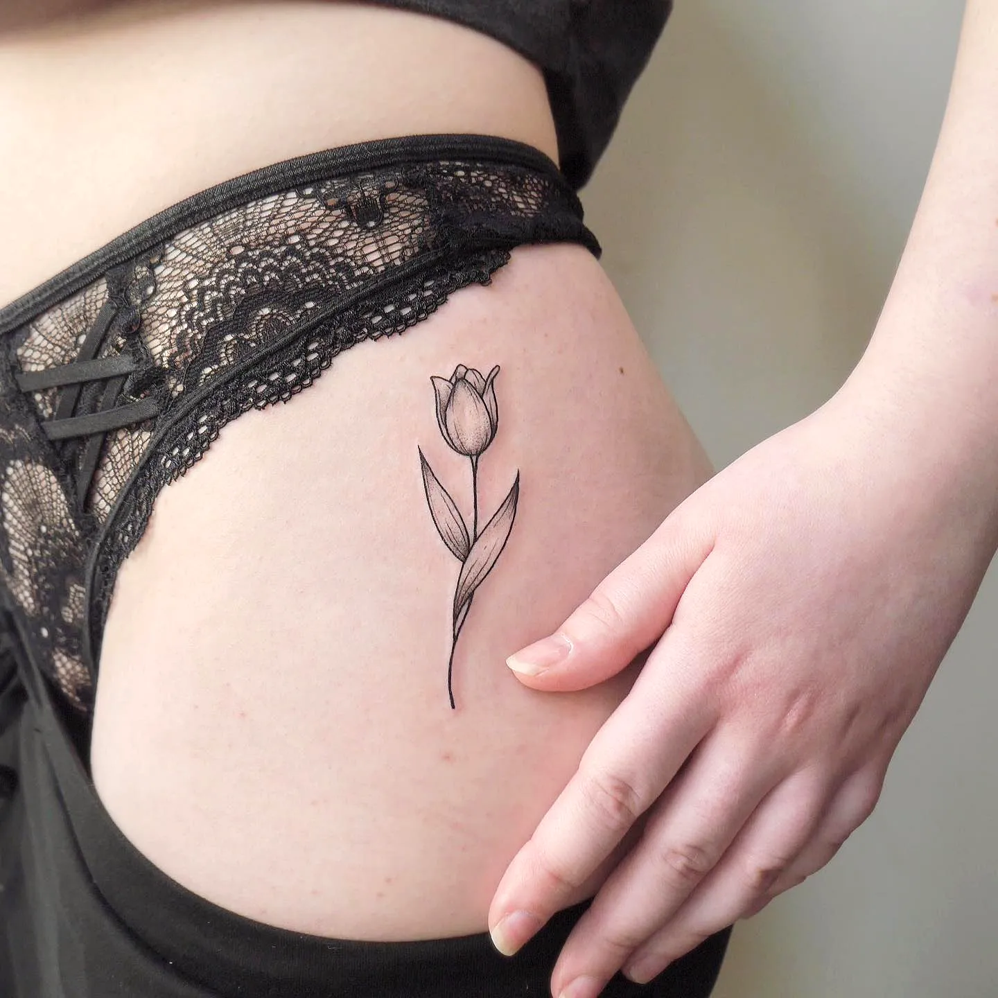 Minimalistic Tulip Thigh Tattoo