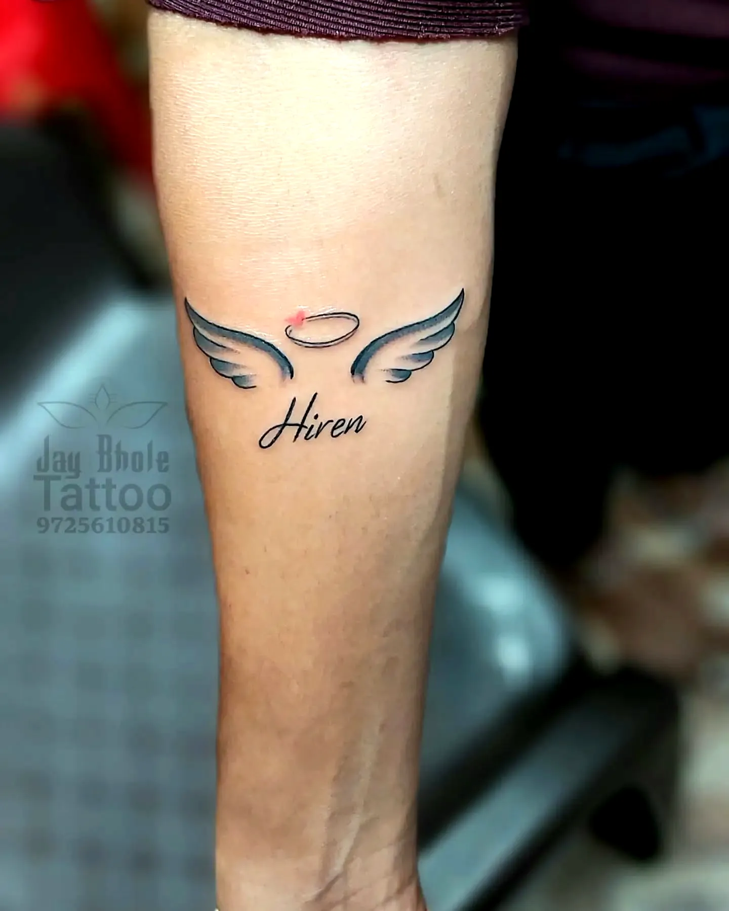 Minimalistic Wings Forearm Tattoo